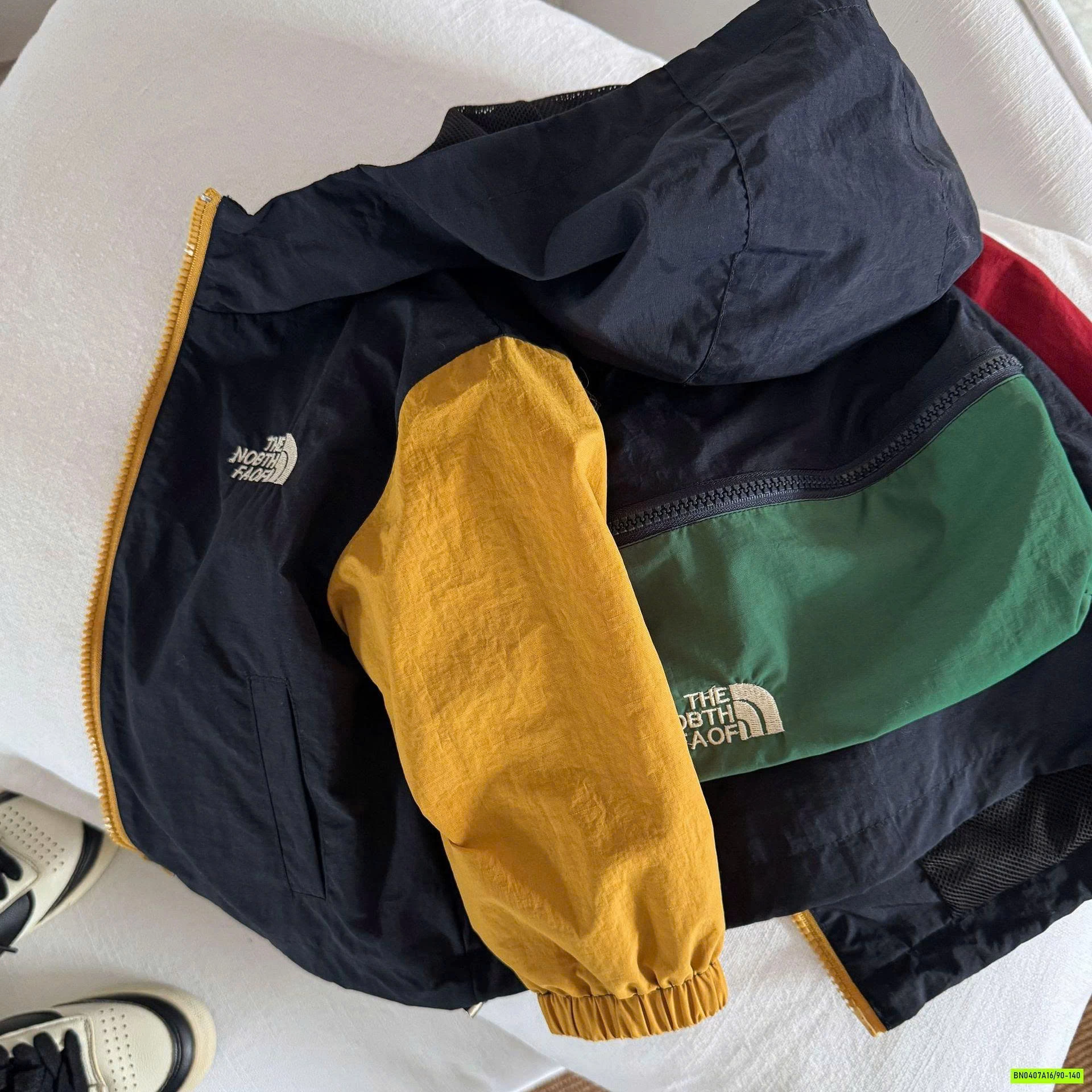 KHOÁC GIÓ TÚI LƯNG PHỐI MÀU MMY