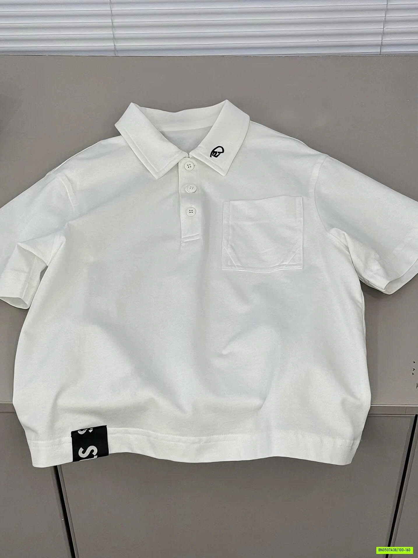 POLO TRẮNG TÚI NGỰC