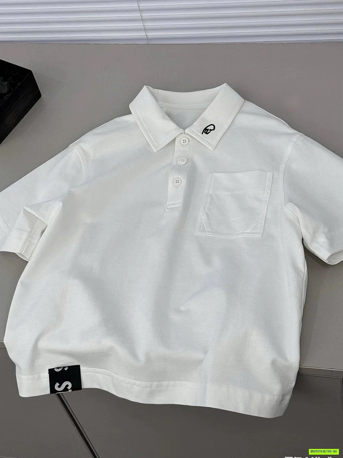 POLO TRẮNG TÚI NGỰC