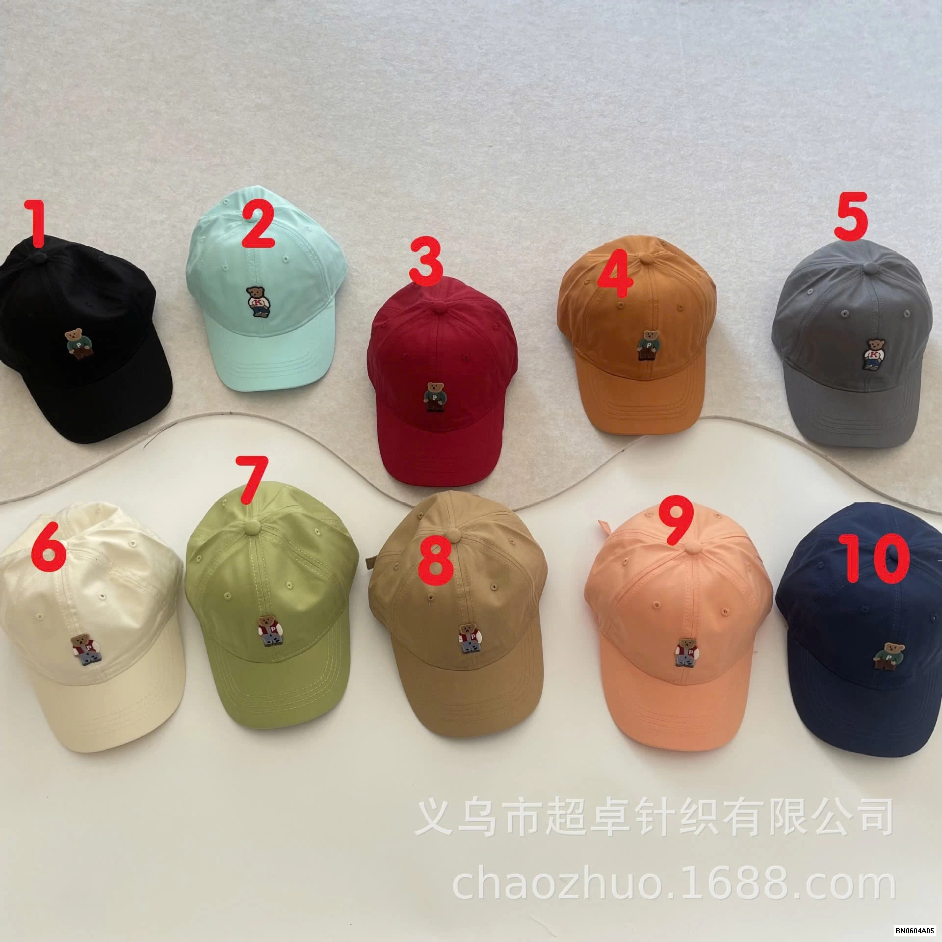 MŨ KẾT THÊU LOGO GẤU