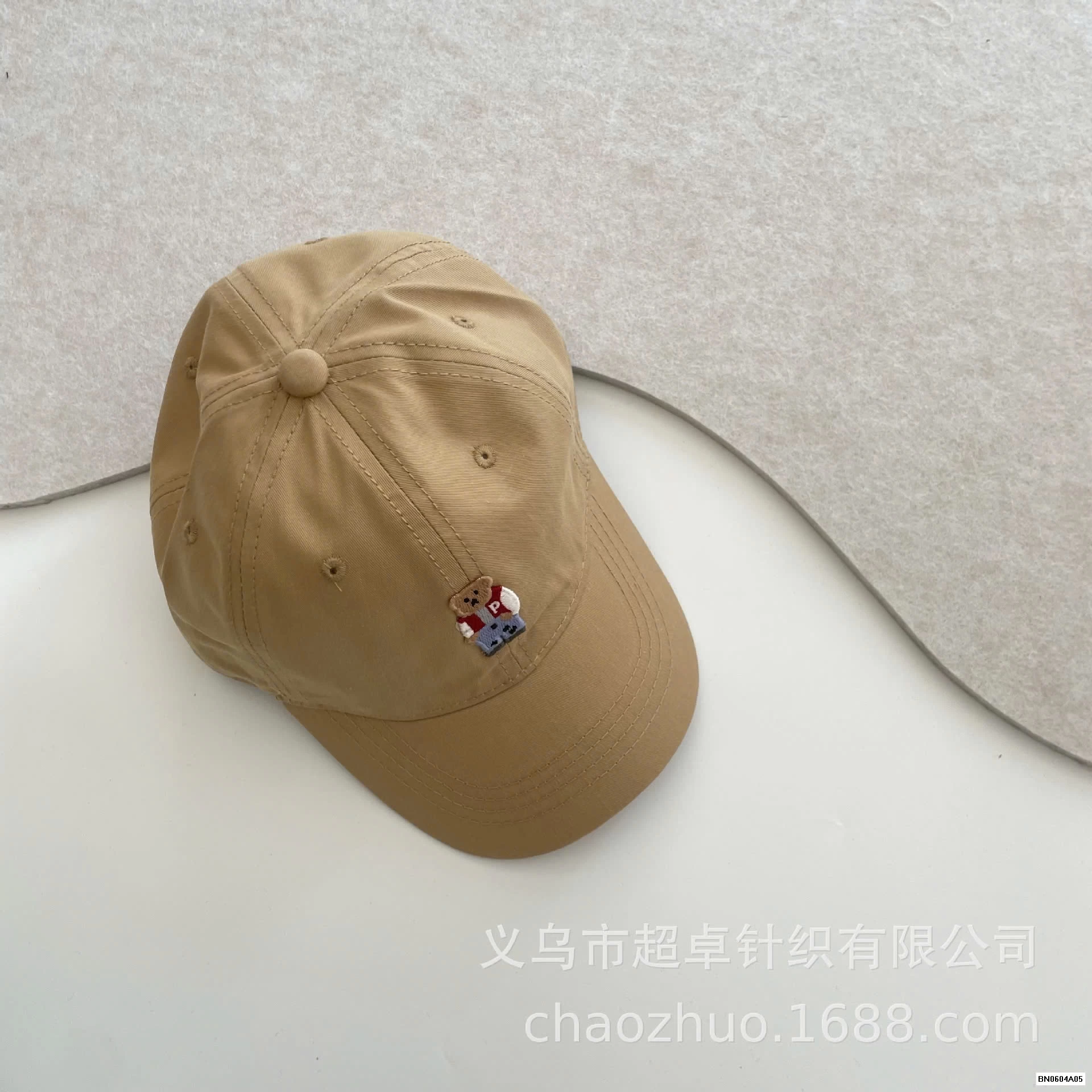 MŨ KẾT THÊU LOGO GẤU