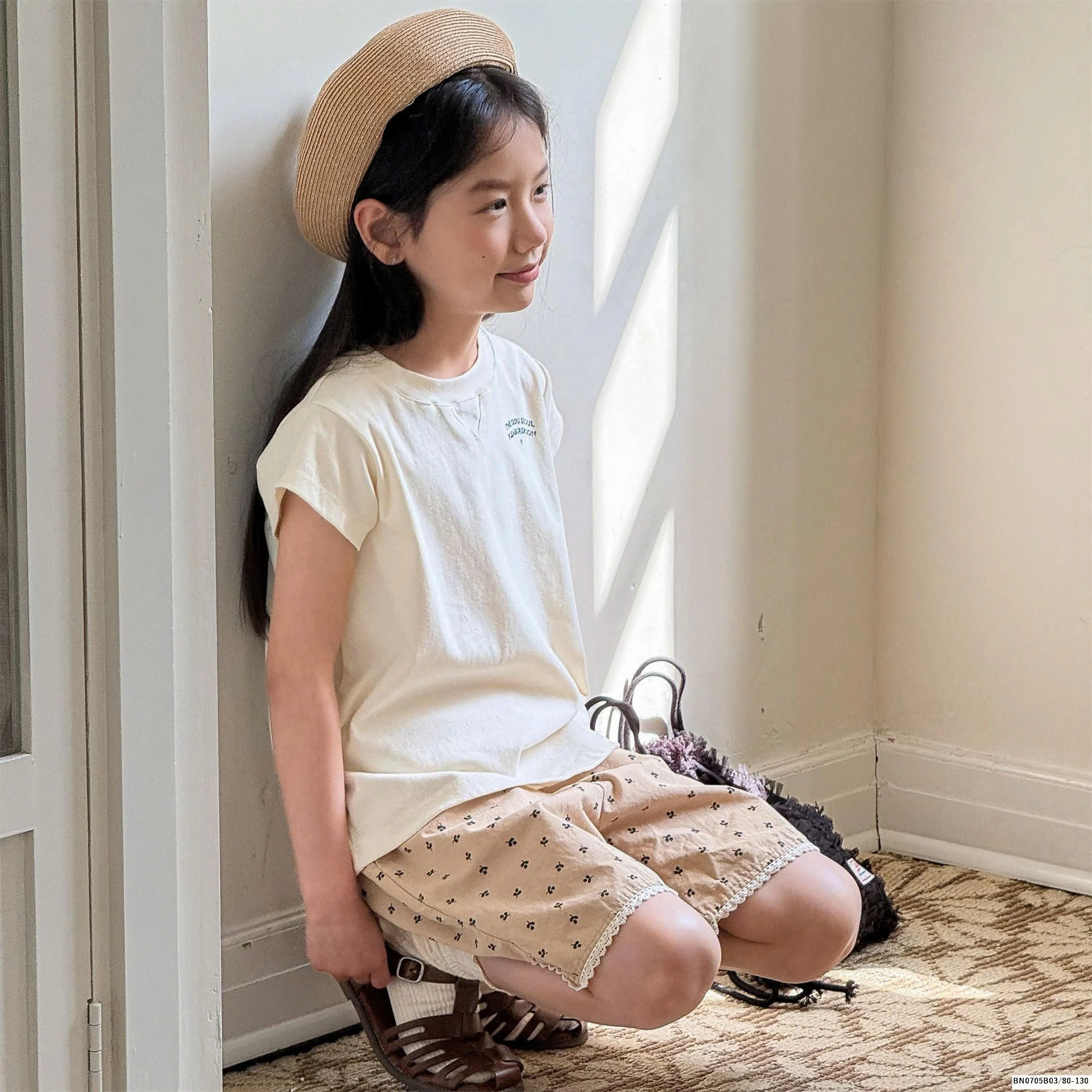 SHORT THÔ IN HOA NHÍ VIỀN REN ADBABY