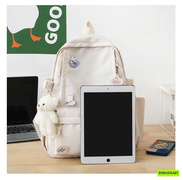 BALO KÈM MÓC GẤU VÀ HUY HIỆU