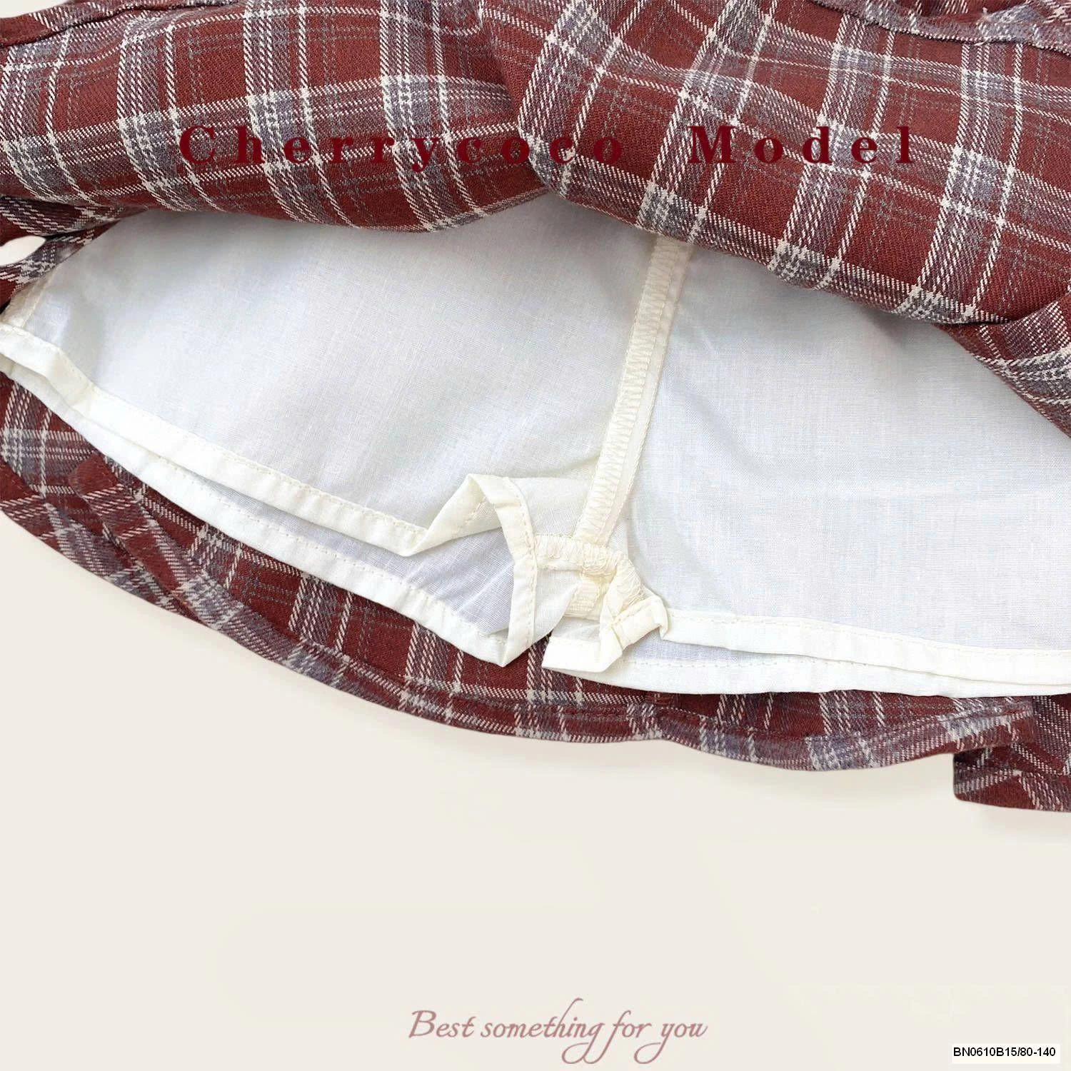 CHÂN VÁY CARO ĐỎ CHERY COCO