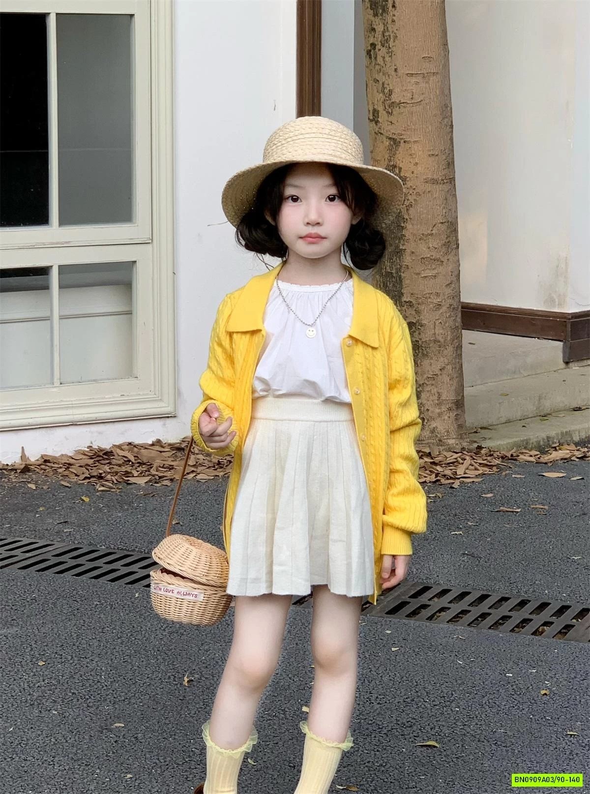 SÉT NỮ SINH CARDIGAN VÀNG 3 CHI TIẾT