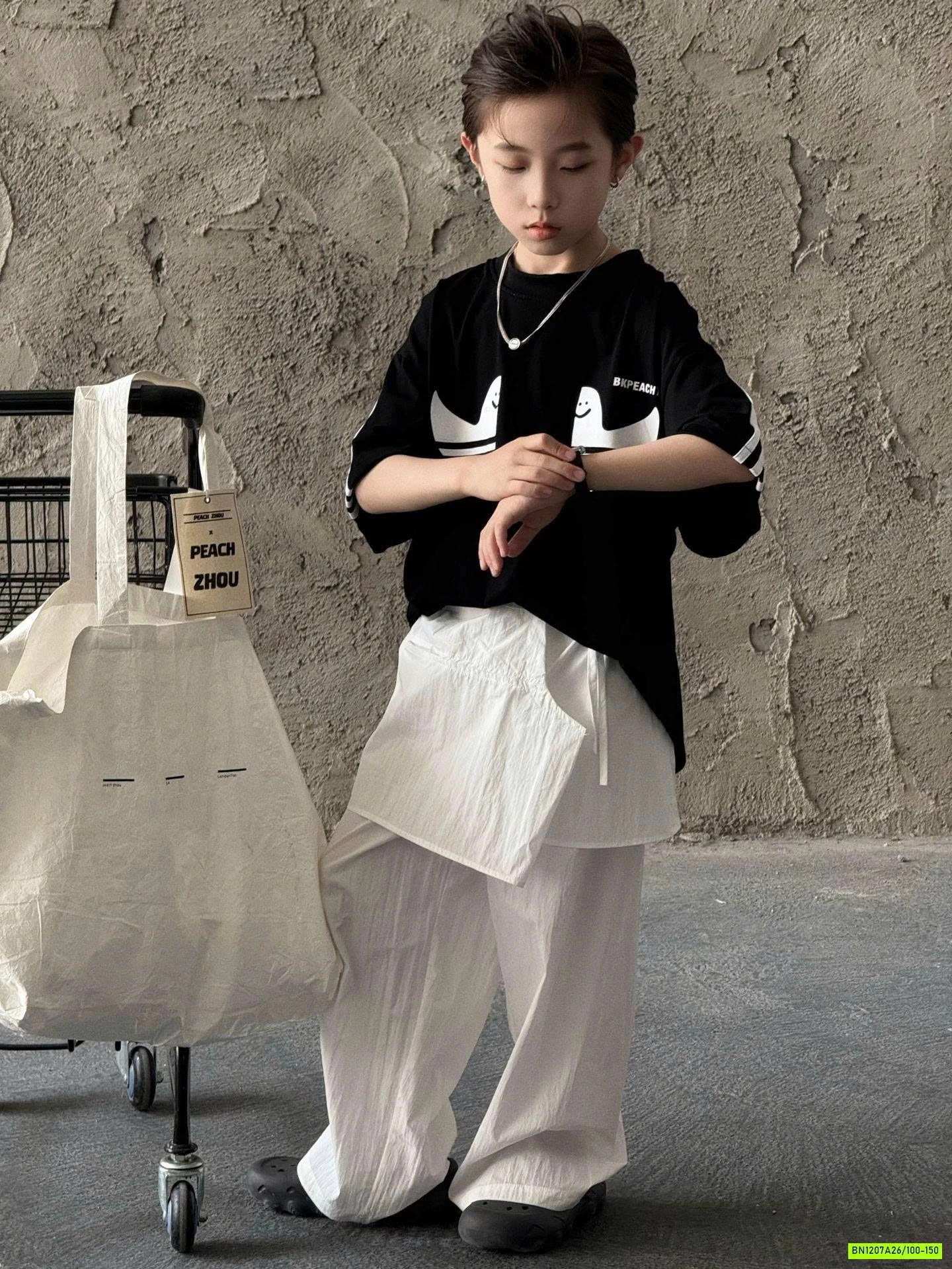 ÁO ĐEN GOSH SỌC VAI