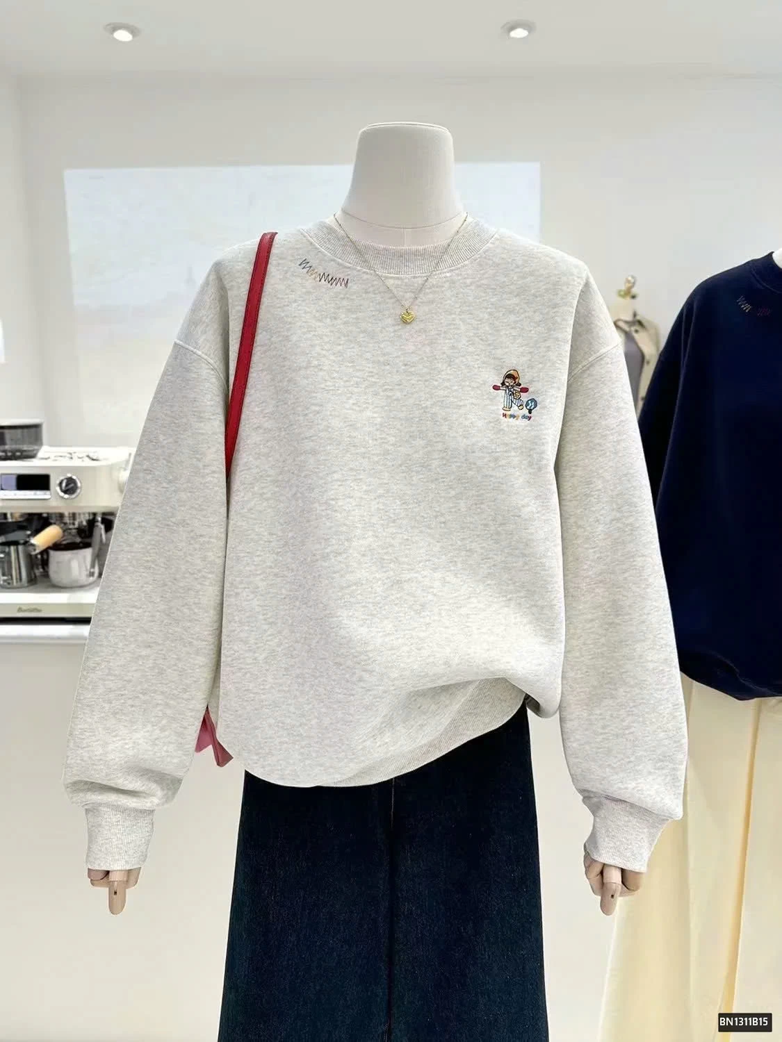 ÁO NỈ LOGO HÌNH NGƯỜI