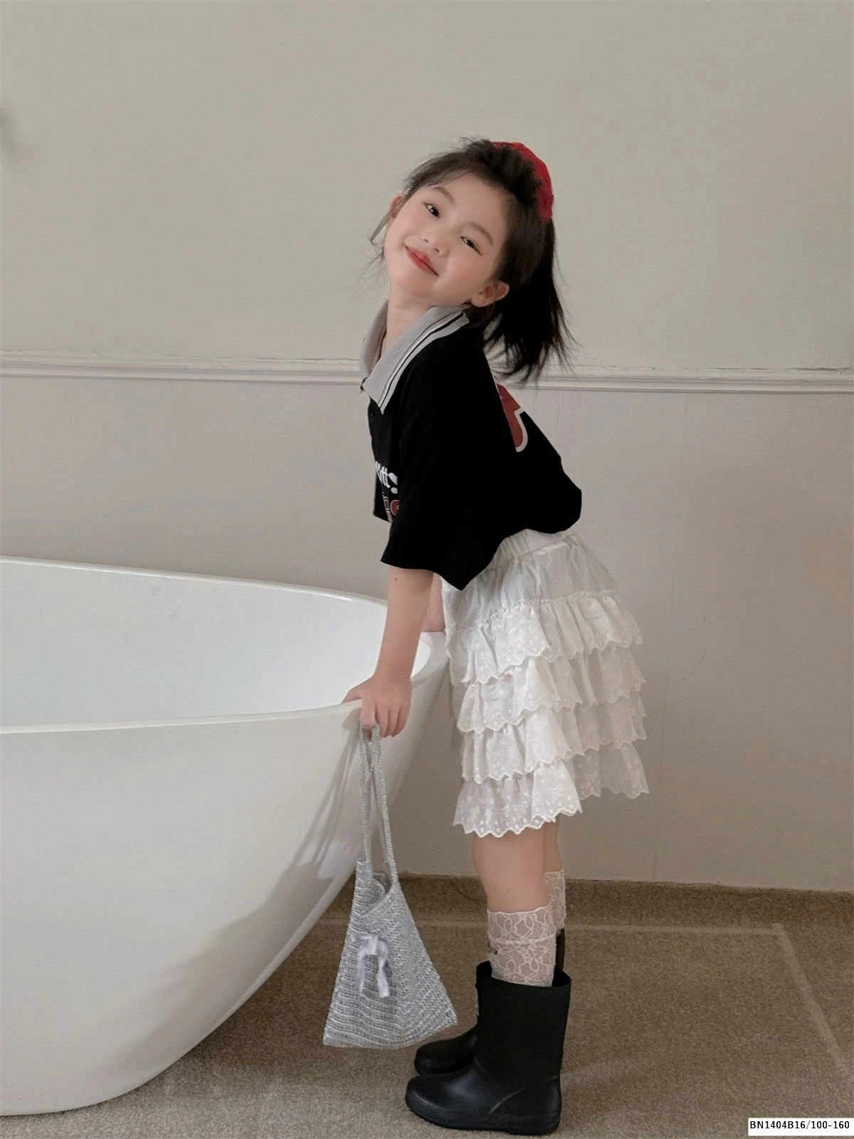 CHÂN VÁY TRẮNG REN TẦNG THÊU NƠ