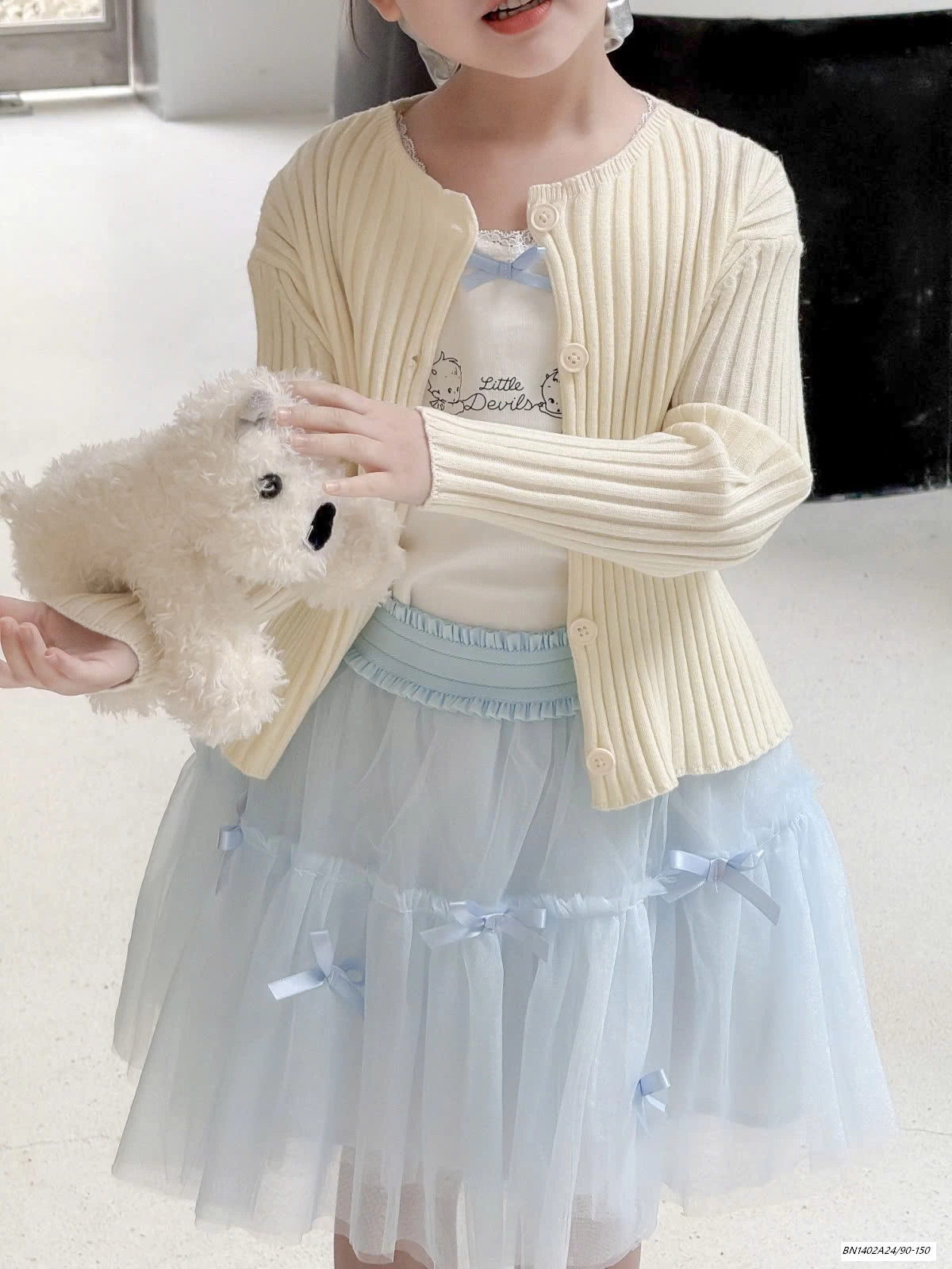 CHÂN VÁY VOAN BỒNG GẮN NƠ