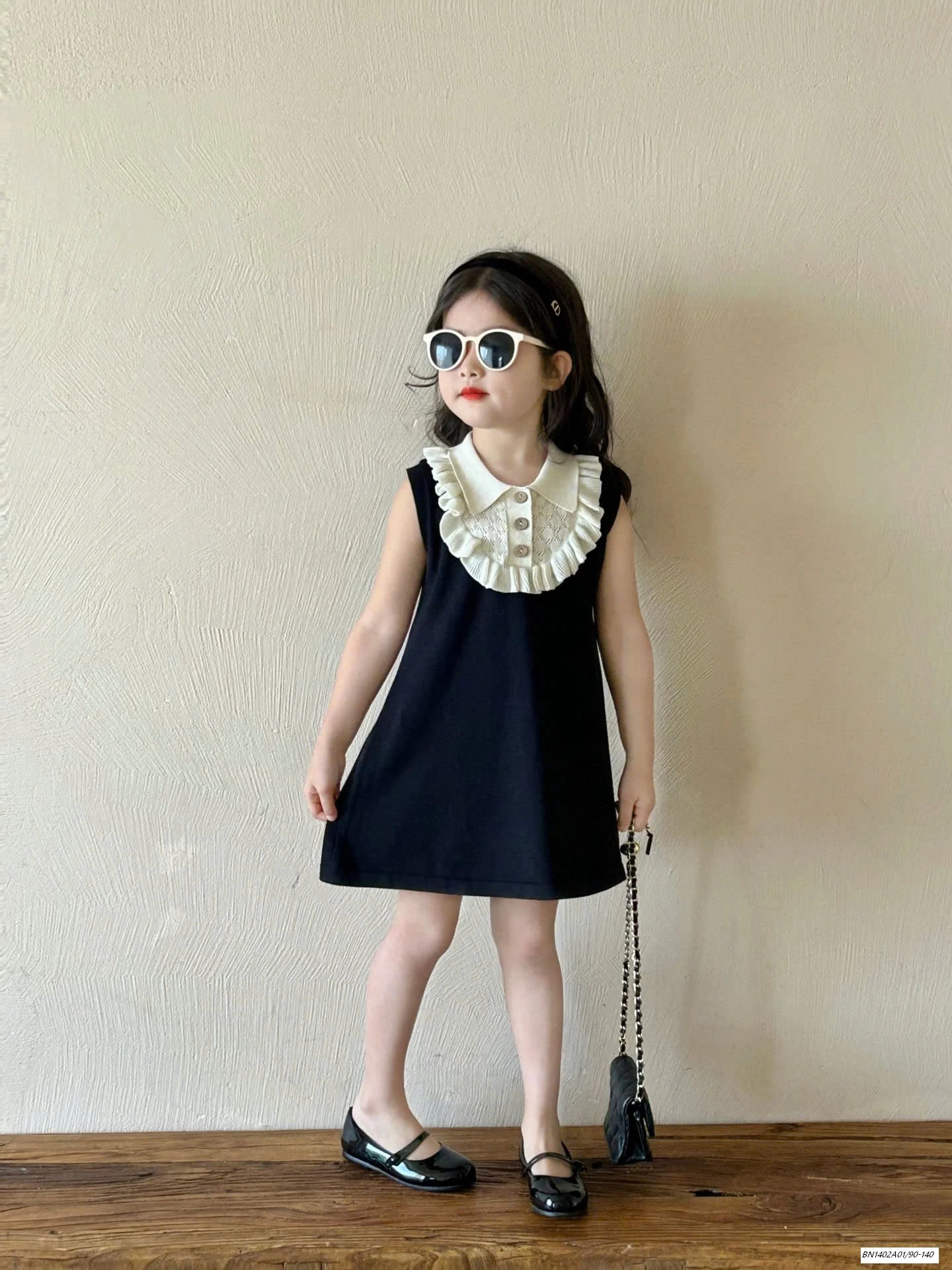 ĐẦM SUÔNG ĐEN CỔ VIỀN BÈO