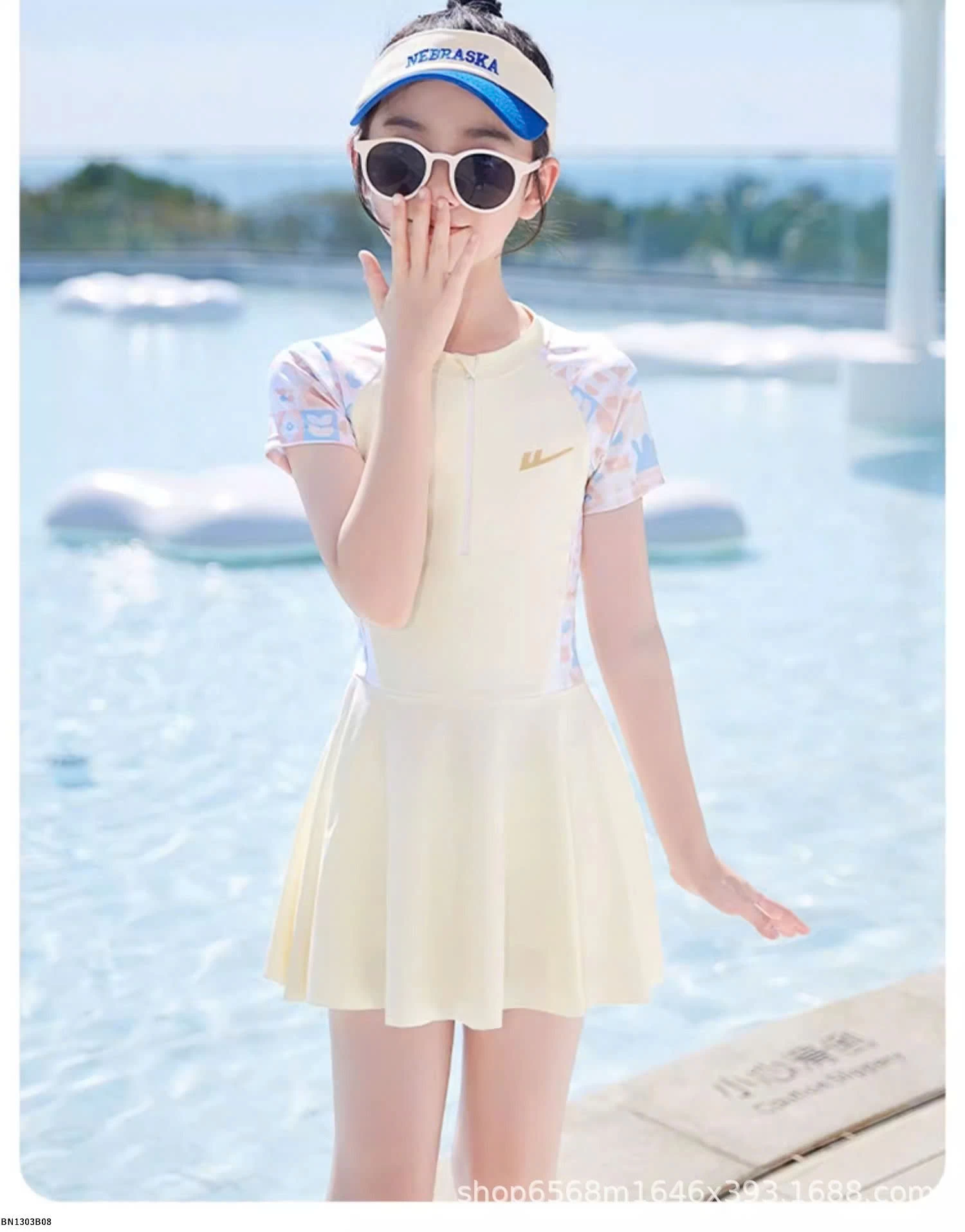 VÁY BƠI TRẮNG KEM BÉ GÁI