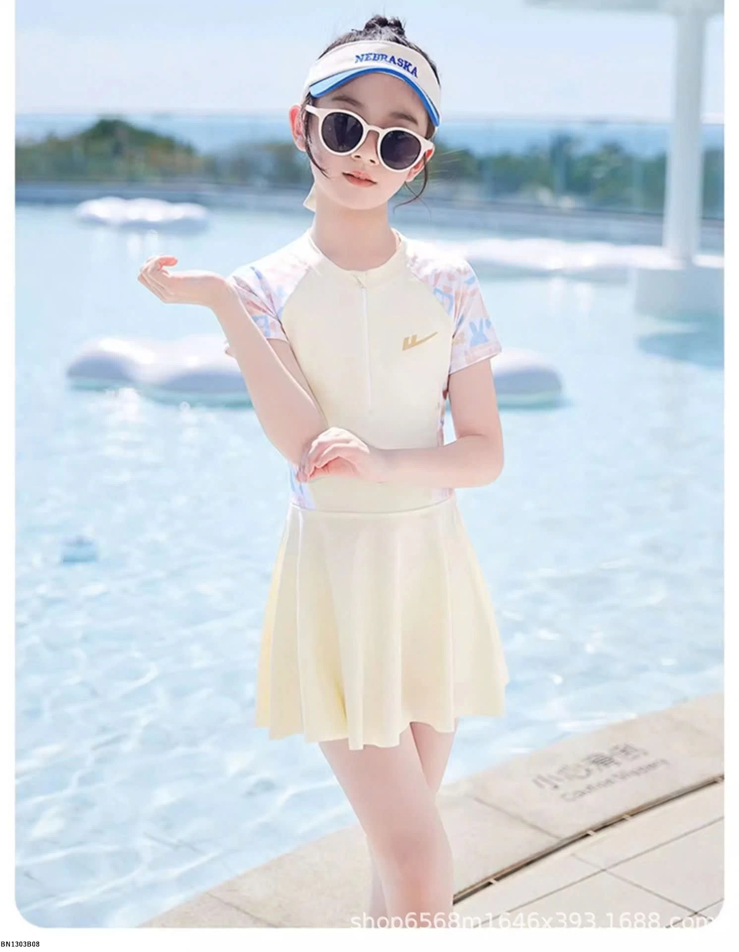 VÁY BƠI TRẮNG KEM BÉ GÁI