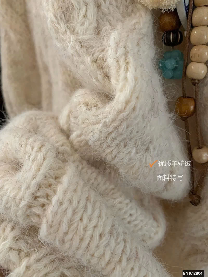 ÁO LEN THỪNG DÁN DÀI NỮ