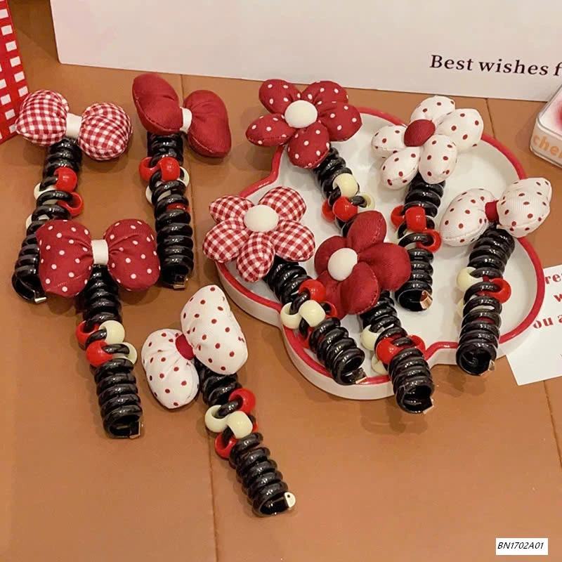 SÉT 4 DÂY BUỘC TÓC LÒ XO