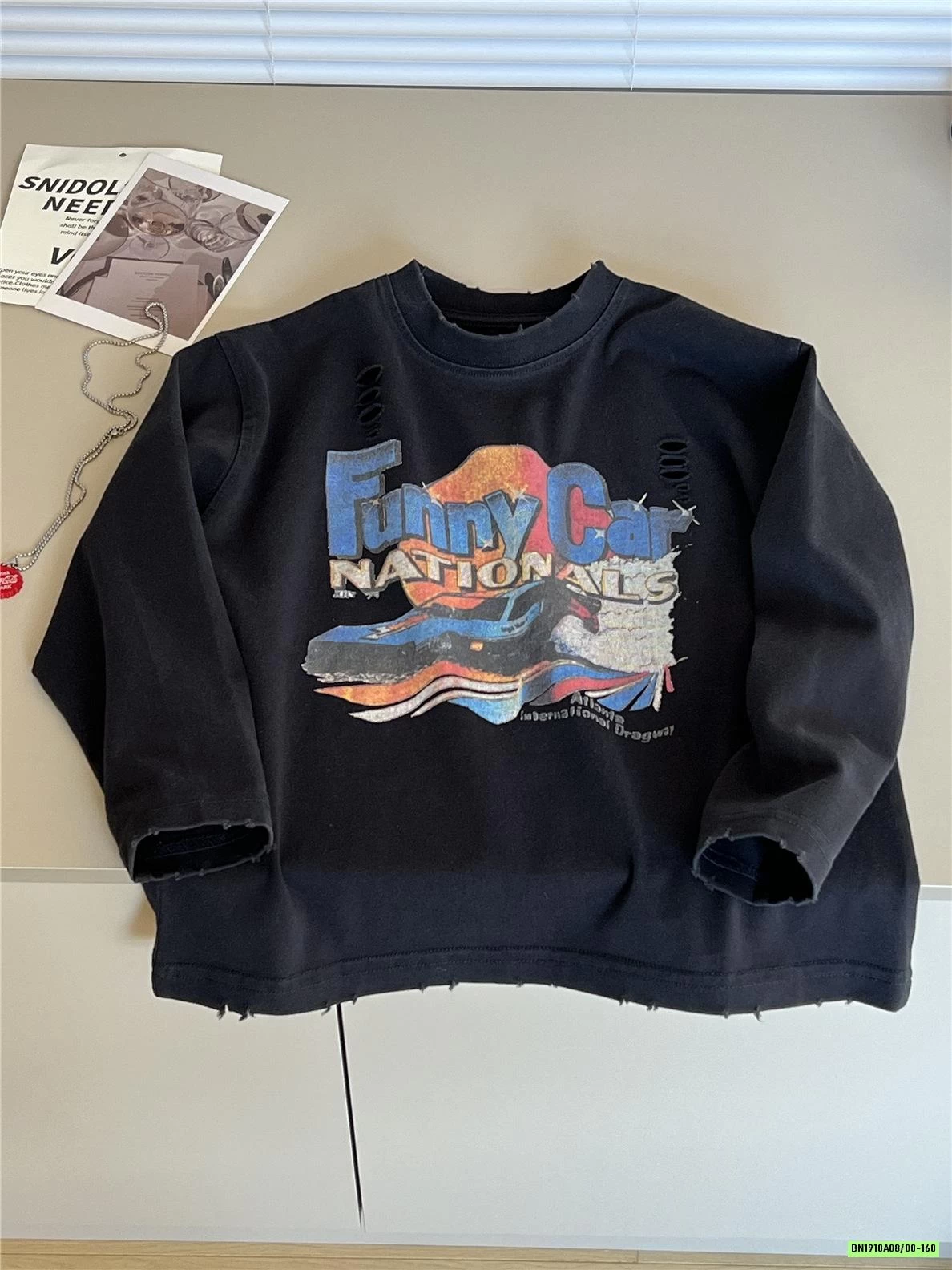 ÁO THUN IN HÌNH RÁCH GẤU