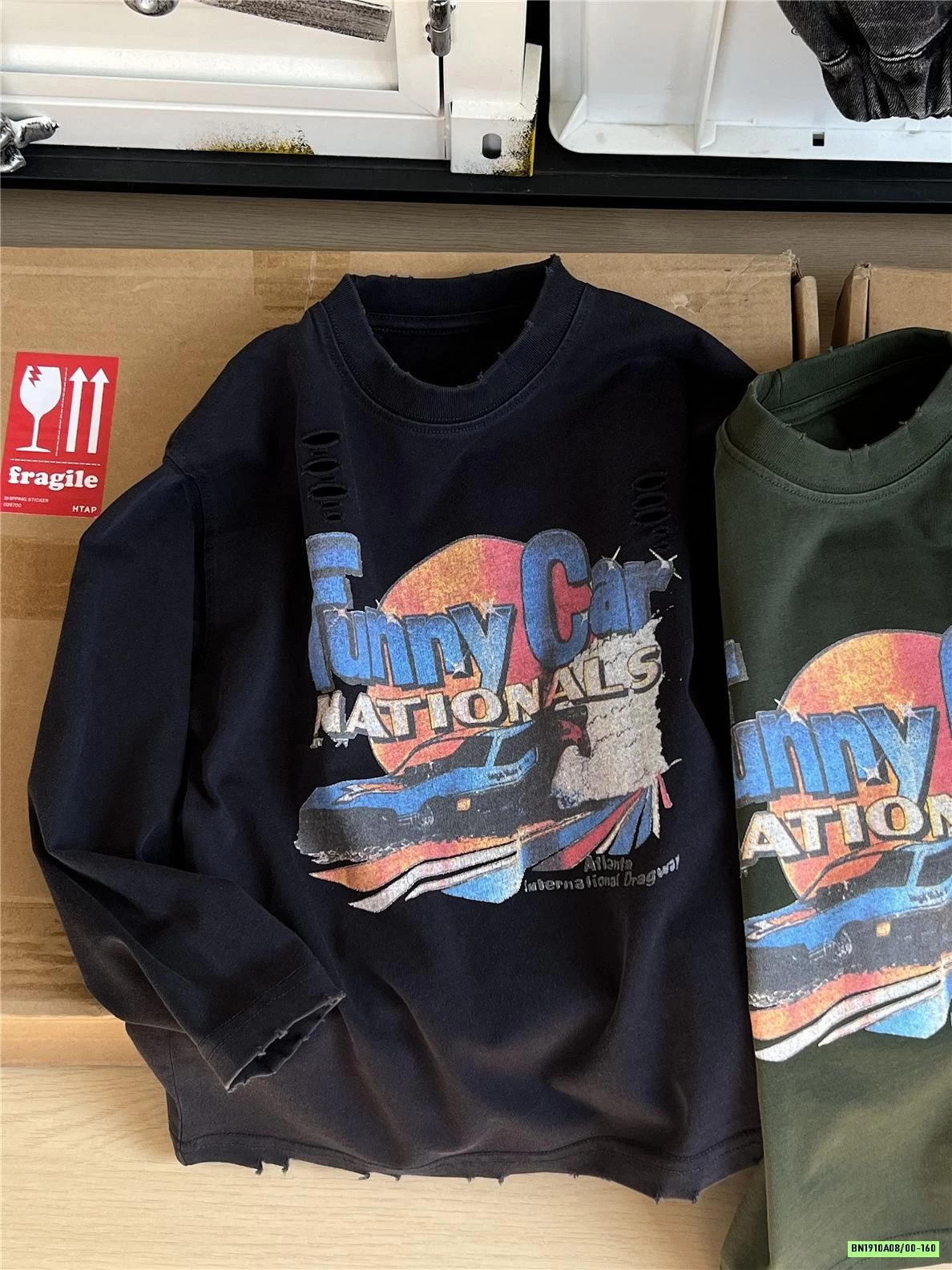 ÁO THUN IN HÌNH RÁCH GẤU