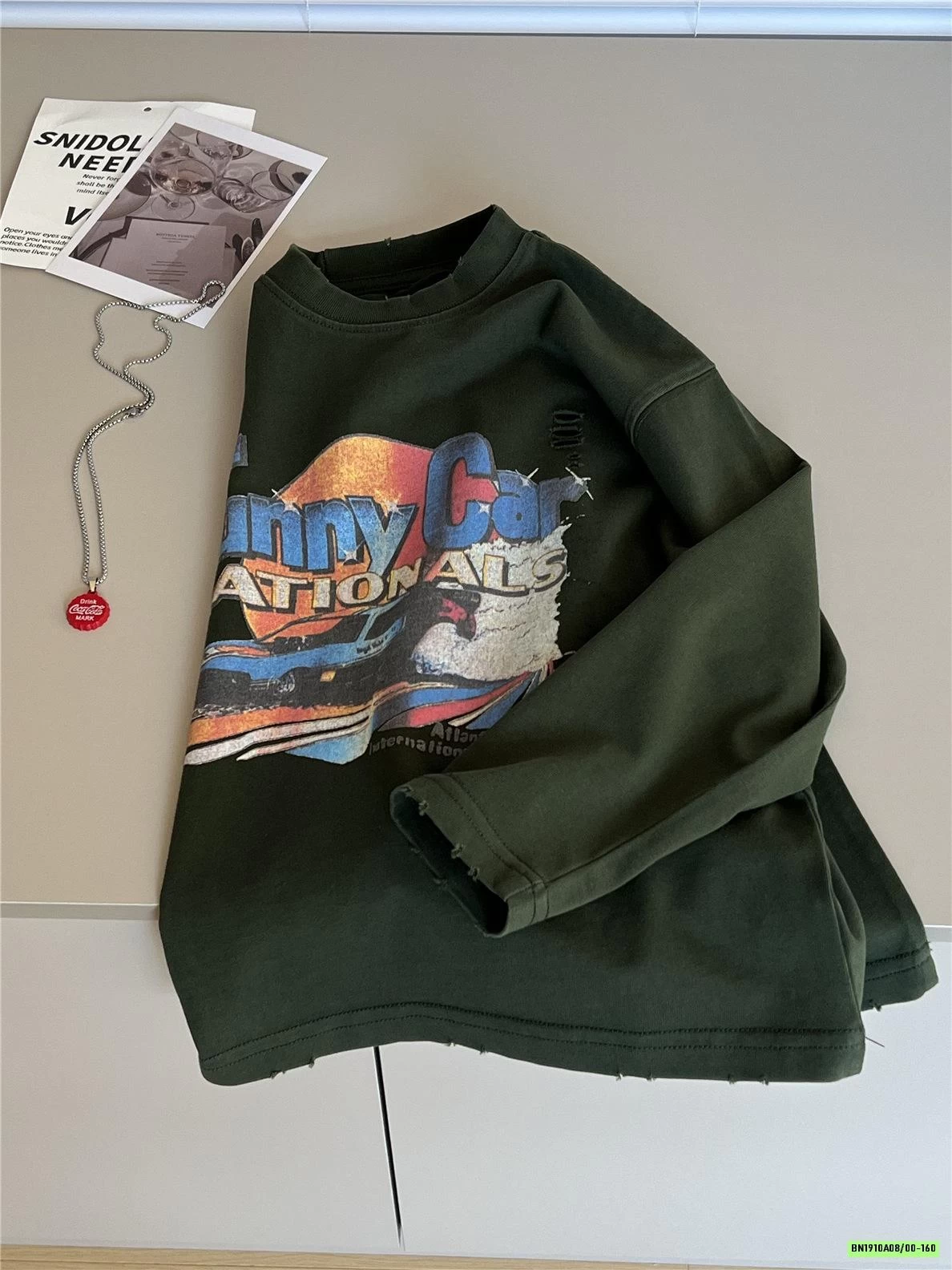 ÁO THUN IN HÌNH RÁCH GẤU