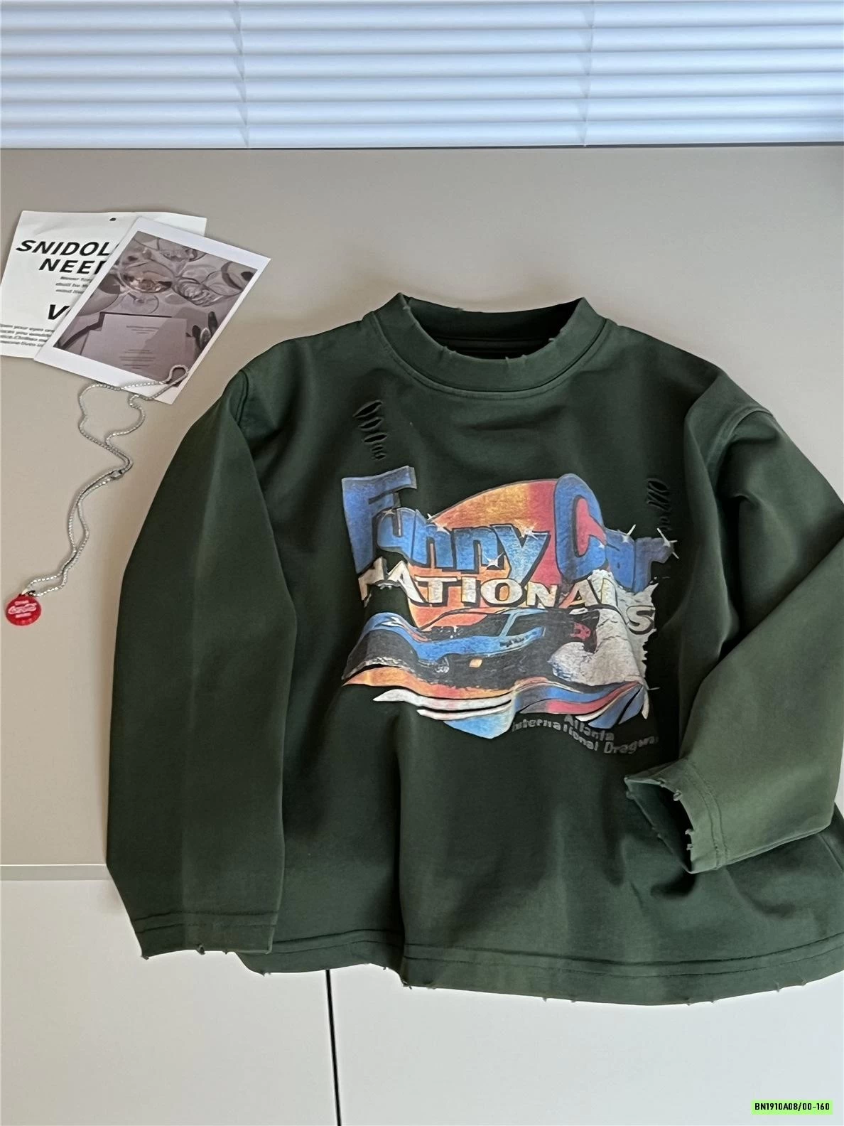 ÁO THUN IN HÌNH RÁCH GẤU