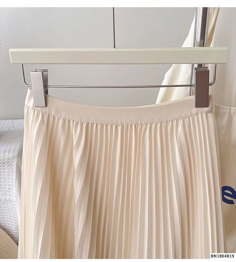 CHÂN VÁY XẾP LY ĐUÔI XÒE