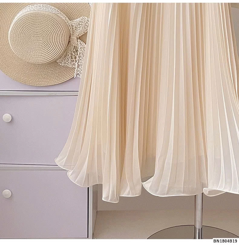 CHÂN VÁY XẾP LY ĐUÔI XÒE