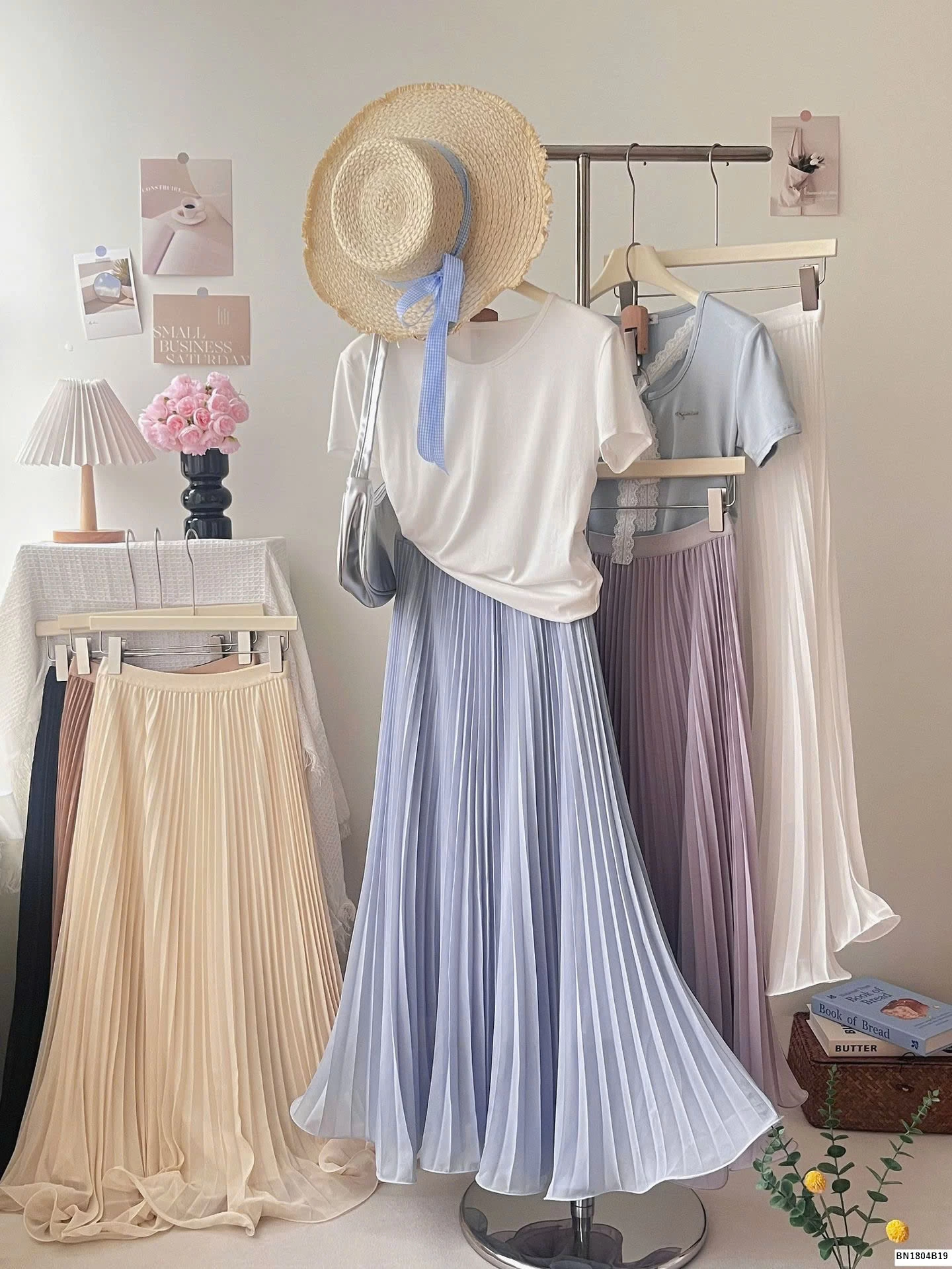 CHÂN VÁY XẾP LY ĐUÔI XÒE