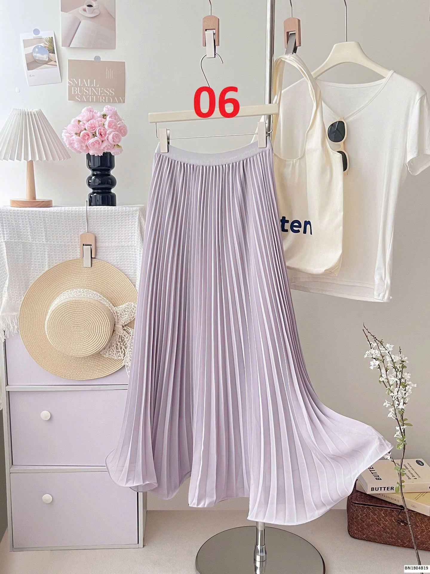 CHÂN VÁY XẾP LY ĐUÔI XÒE