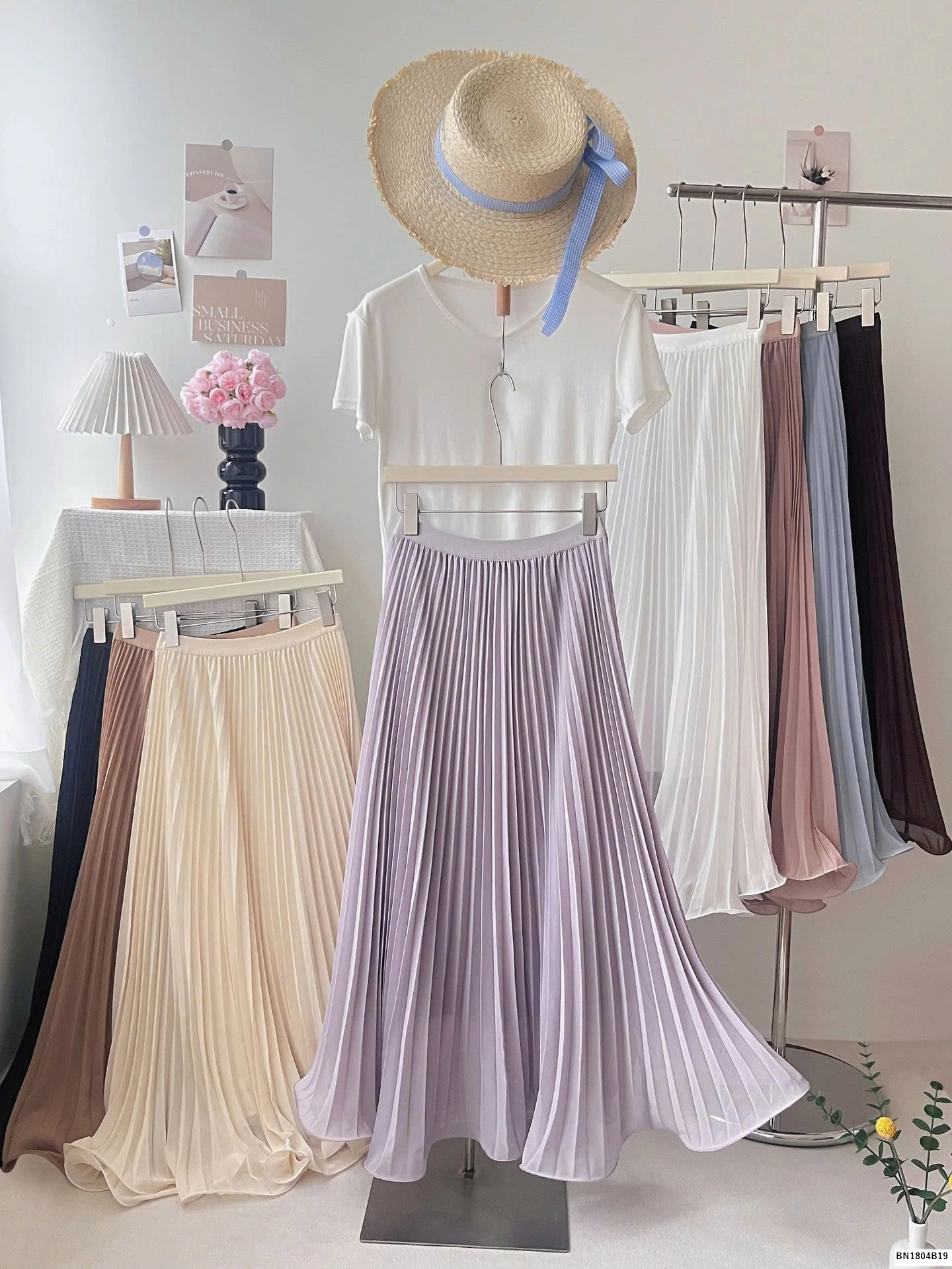 CHÂN VÁY XẾP LY ĐUÔI XÒE