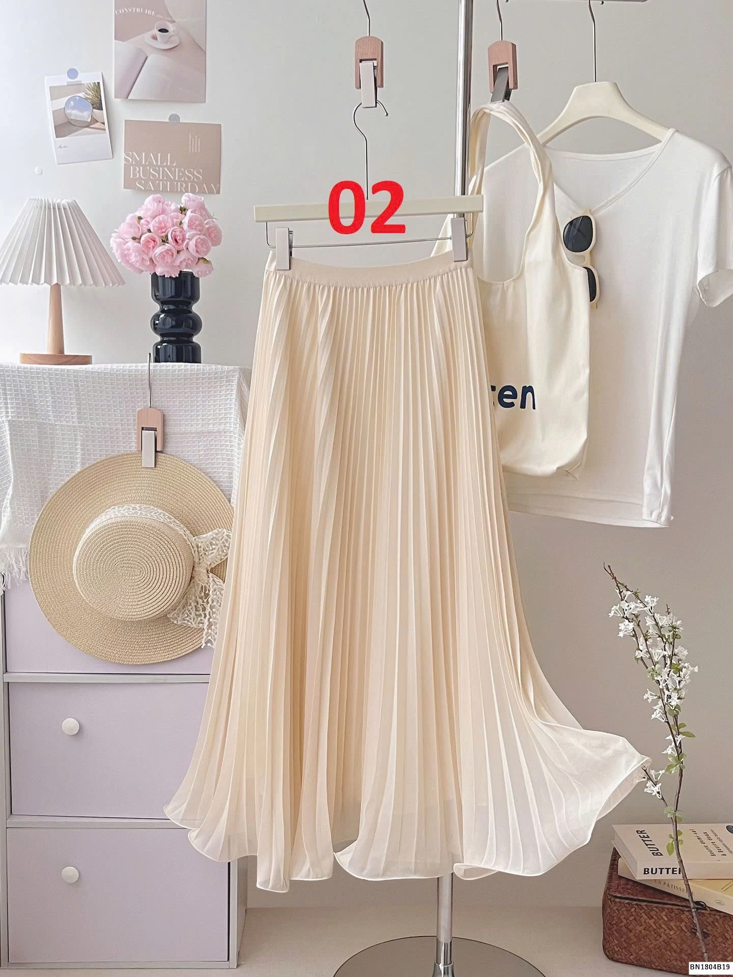 CHÂN VÁY XẾP LY ĐUÔI XÒE