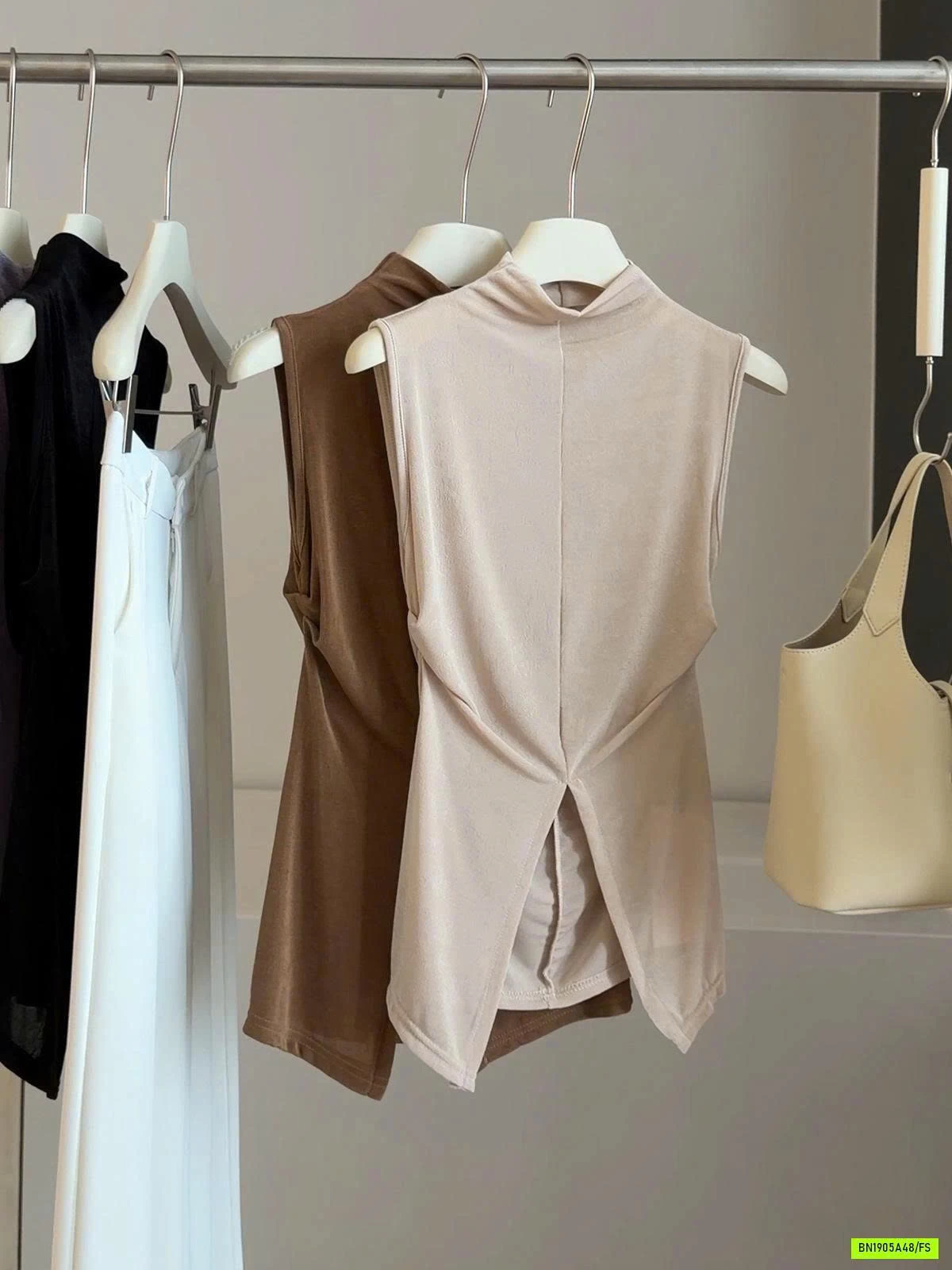 ÁO 3 LỖ KHOÉT LƯNG CUT EO ANNA