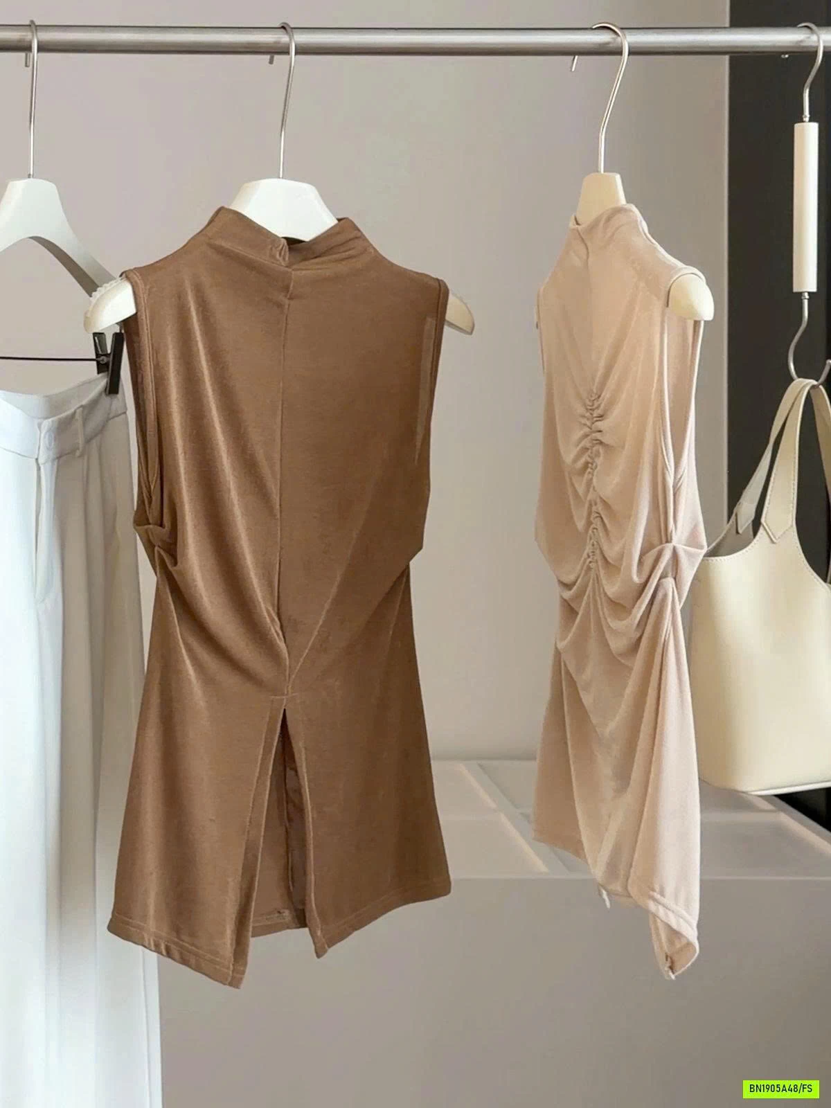 ÁO 3 LỖ KHOÉT LƯNG CUT EO ANNA