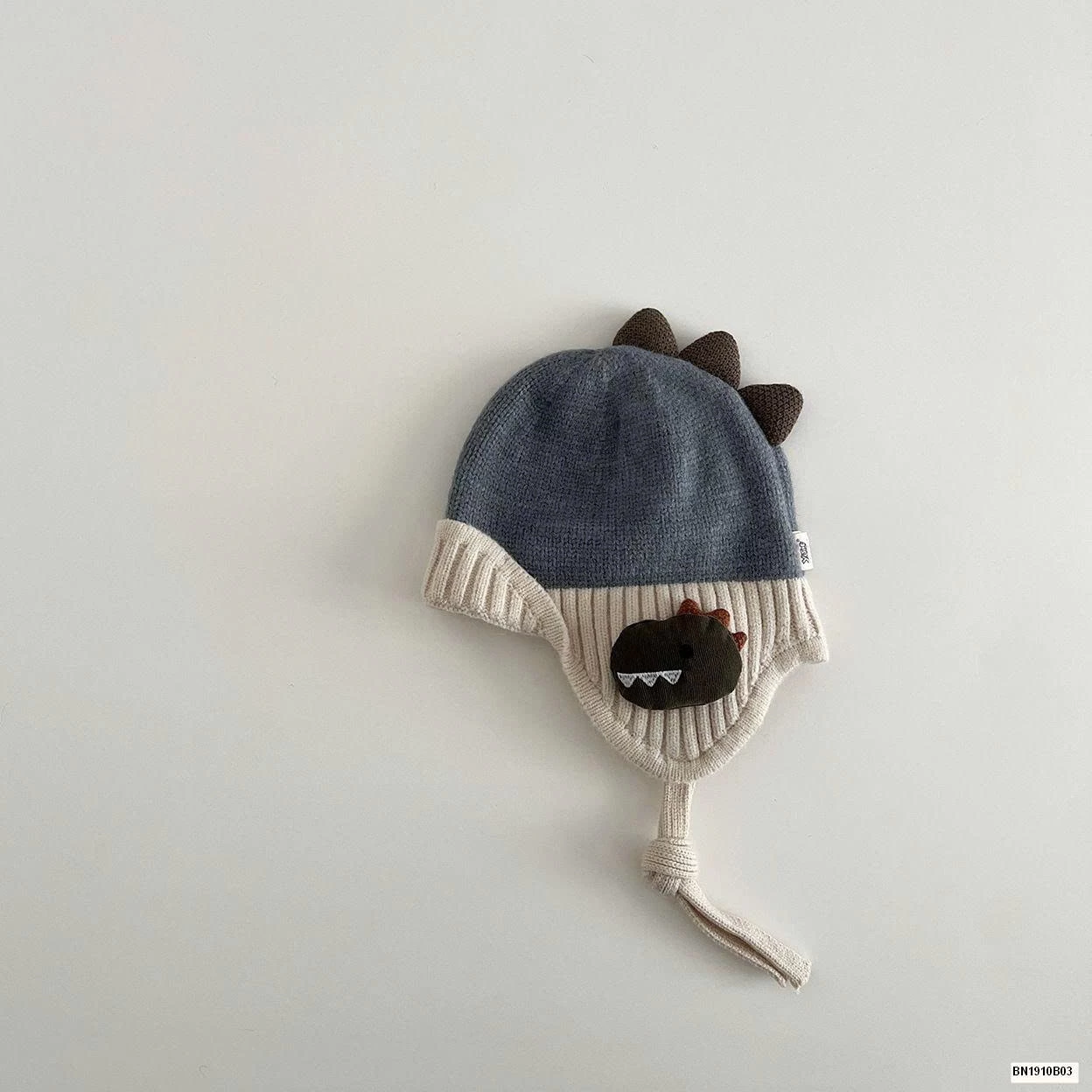 MŨ LEN BỊT TAI KHỦNG LONG