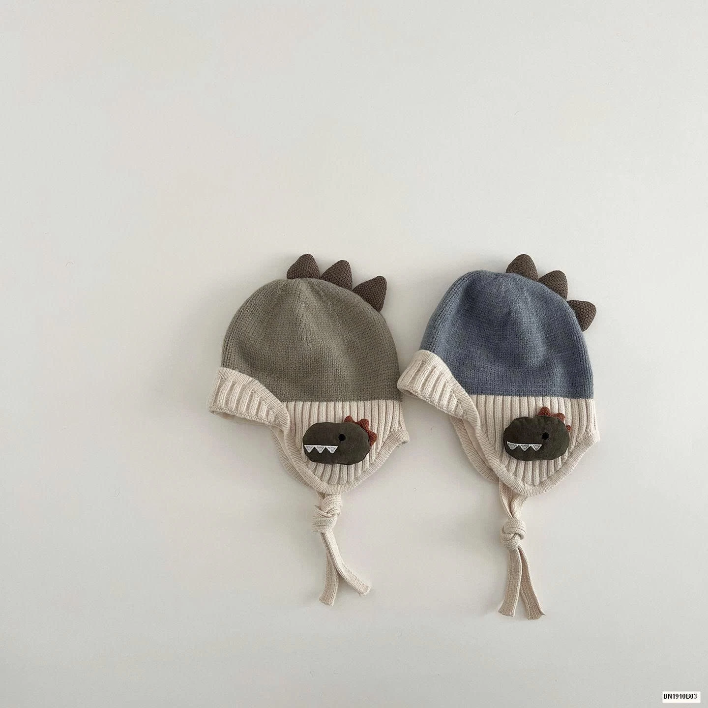 MŨ LEN BỊT TAI KHỦNG LONG