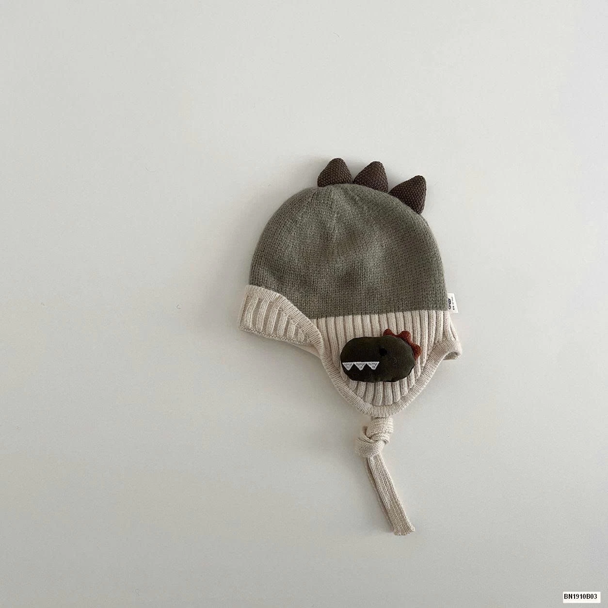 MŨ LEN BỊT TAI KHỦNG LONG