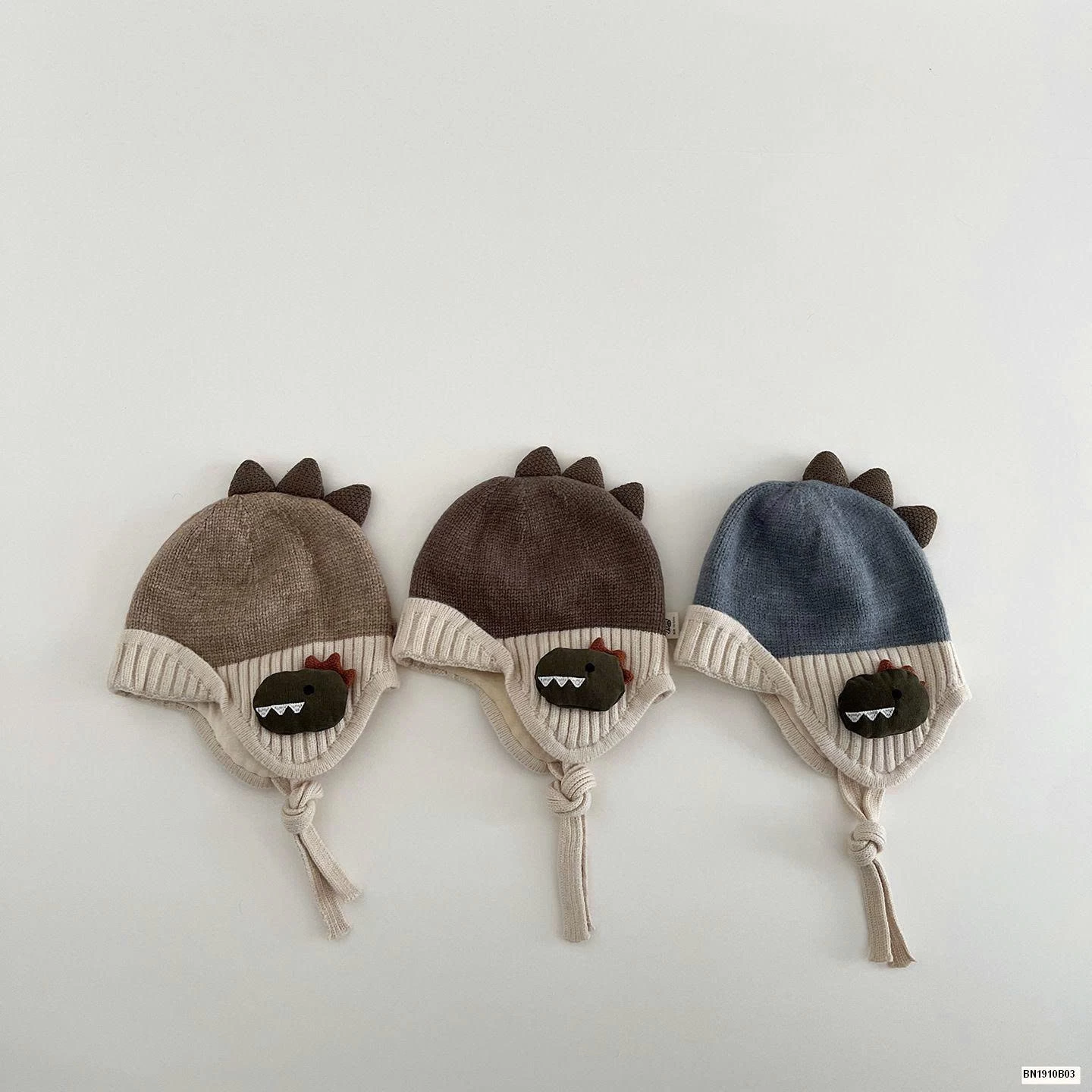 MŨ LEN BỊT TAI KHỦNG LONG