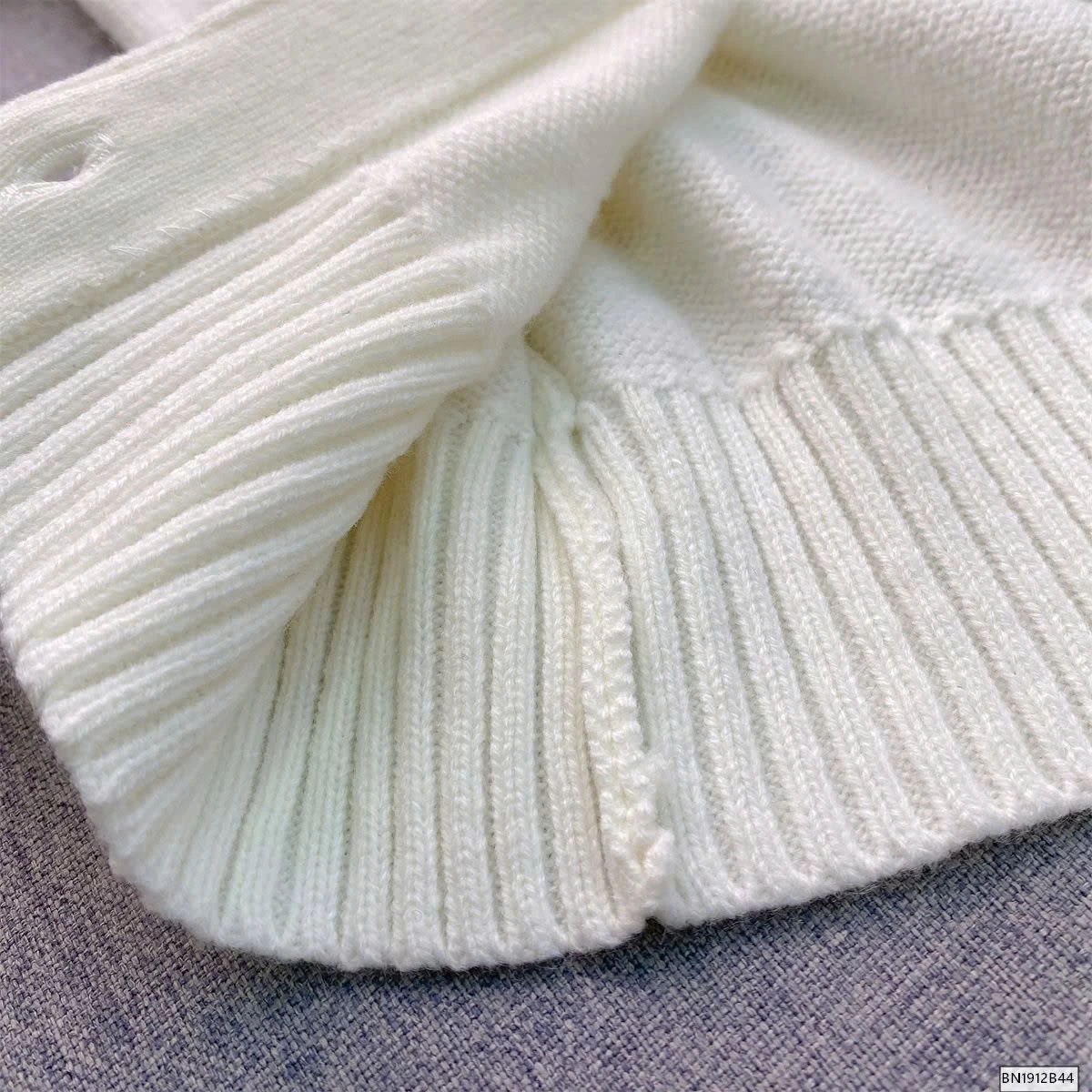 ÁO LEN MỎNG ĐÍNH NƠ