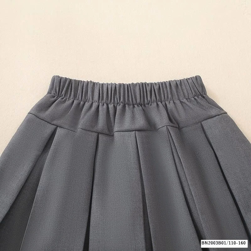 CHÂN VÁY XẾP LY NỮ SINH GẮN NƠ