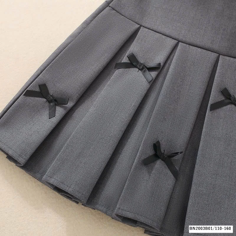 CHÂN VÁY XẾP LY NỮ SINH GẮN NƠ