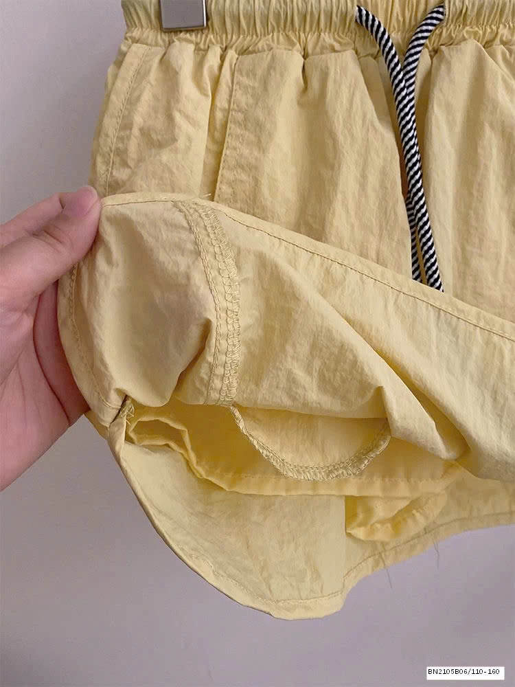 SÉT ÁO THUN XÁM BUỘC NƠ EO MIX QUẦN SHORT VÀNG