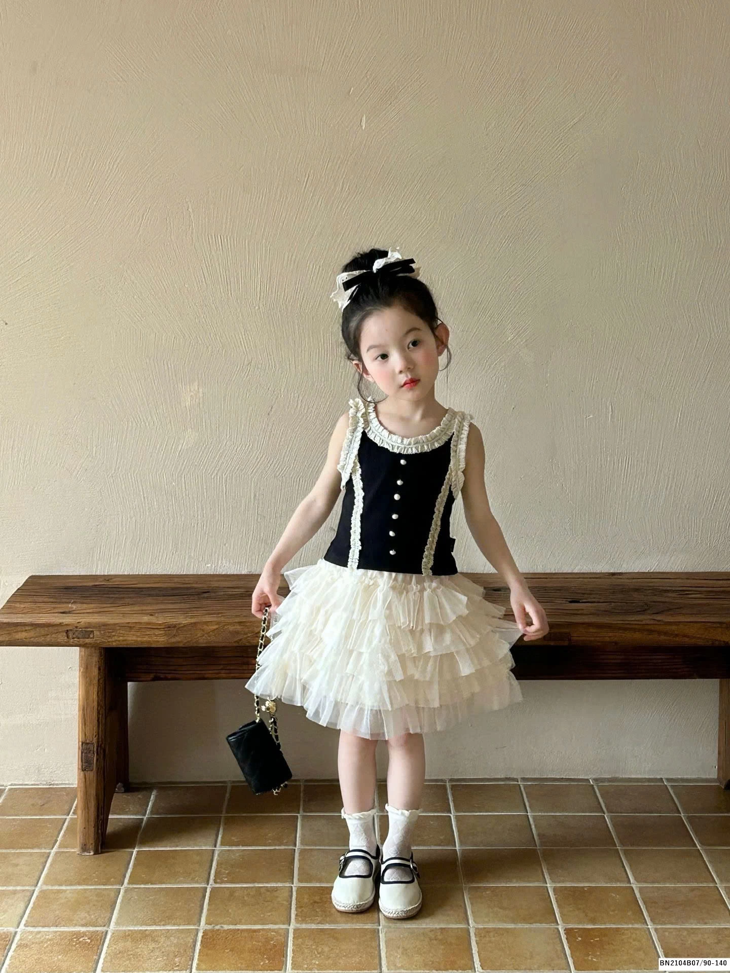 Set áo đen sát nách mix chân váy tutu