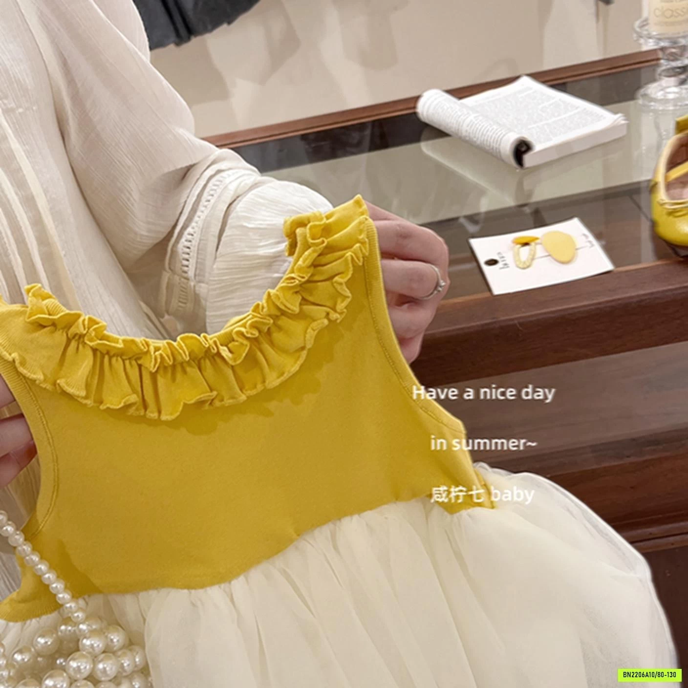 ĐẦM VÀNG PHỐI VOAN TBABY