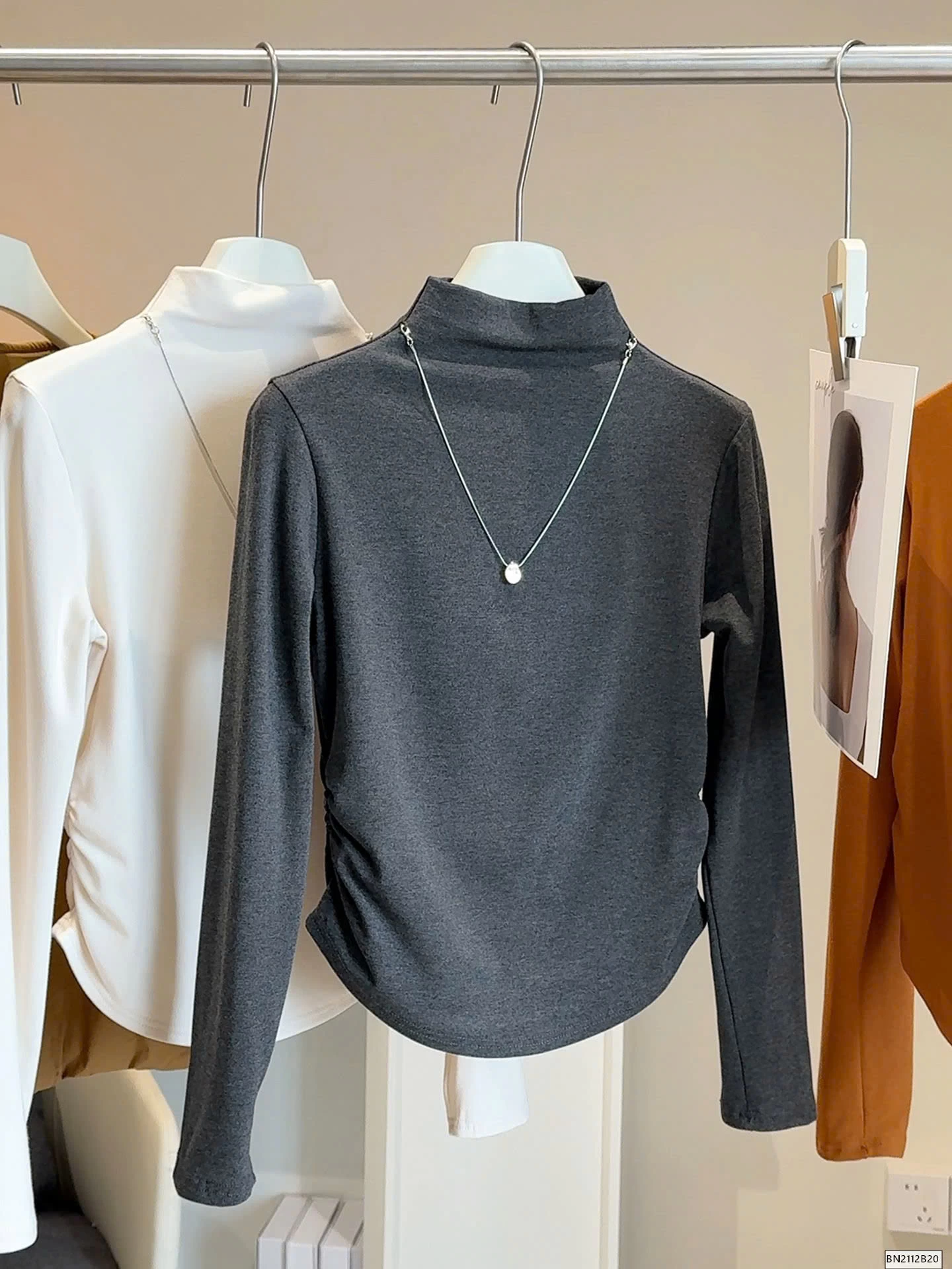 ÁO GIỮ NHIỆT RÚT EO