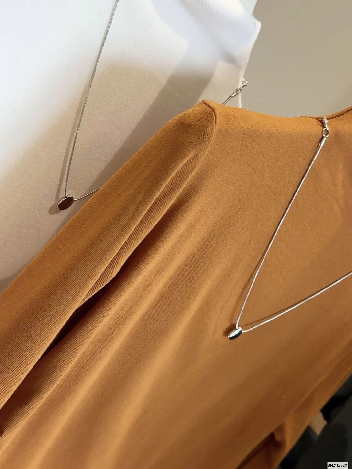 ÁO GIỮ NHIỆT RÚT EO