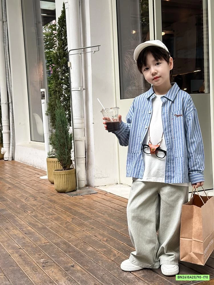 SƠ MI XANH SỌC THÊU LOGO 24X145 AMBB