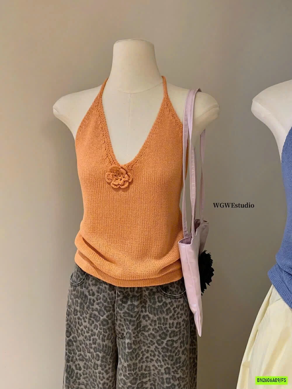 ÁO YẾM MONTOGHI GẤN HOA WG.WE