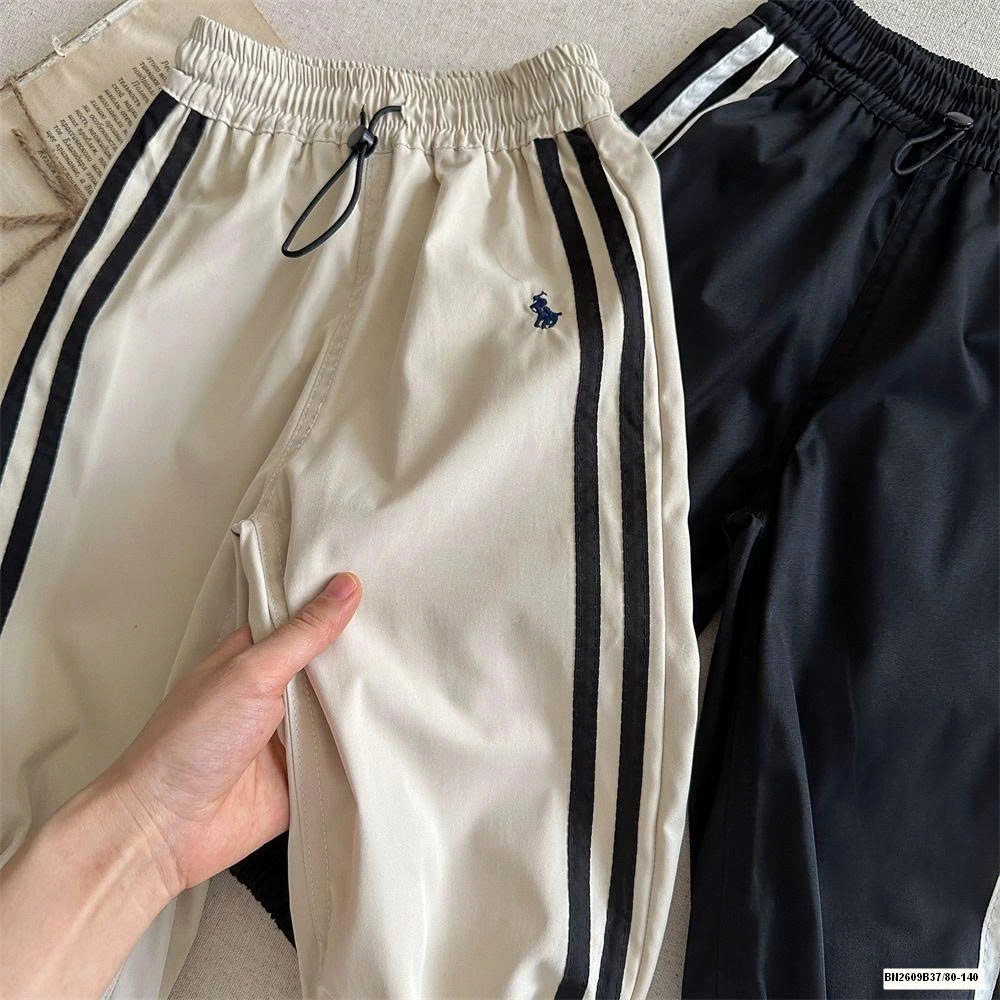 QUẦN GIÓ THỂ THAO SỌC BÊN