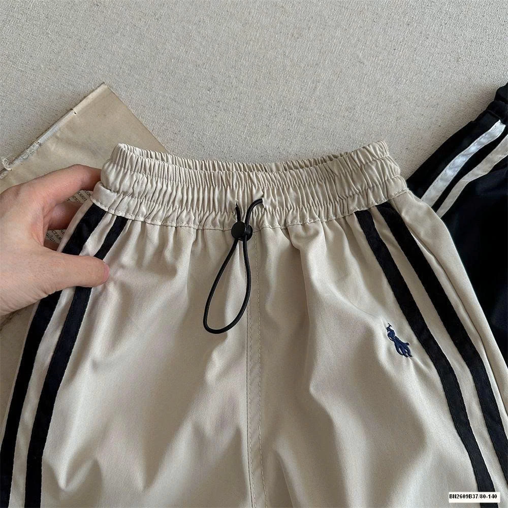 QUẦN GIÓ THỂ THAO SỌC BÊN