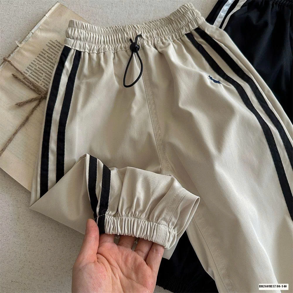 QUẦN GIÓ THỂ THAO SỌC BÊN