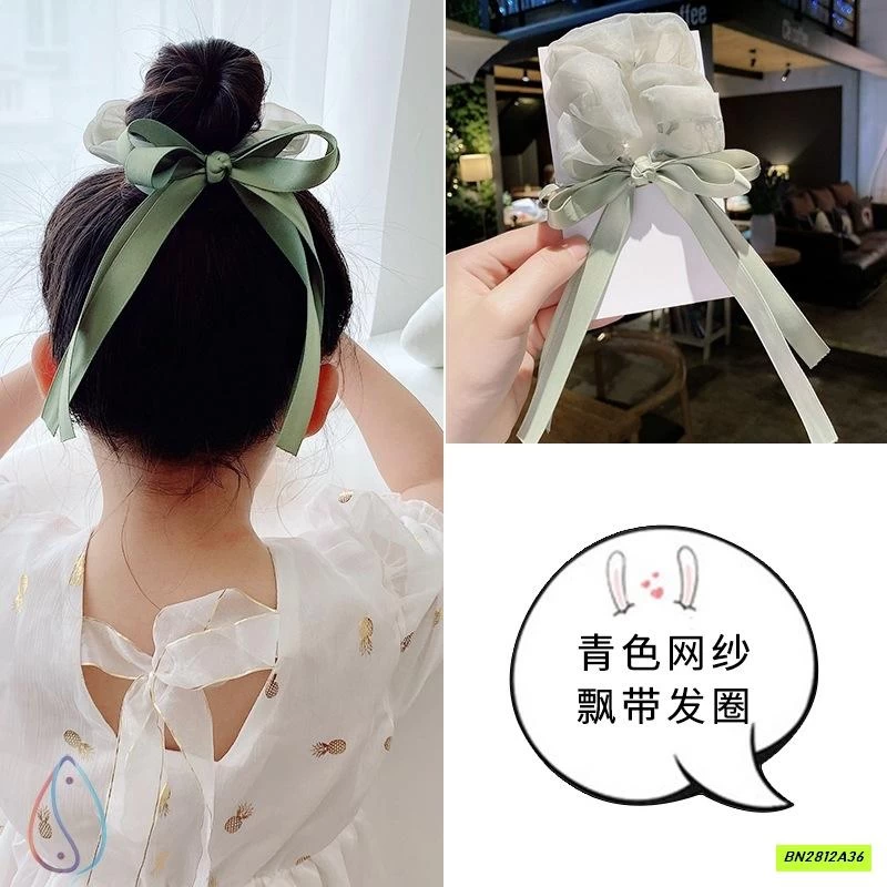 BUỘC TÓC GIẢ NƠ RUY BĂNG