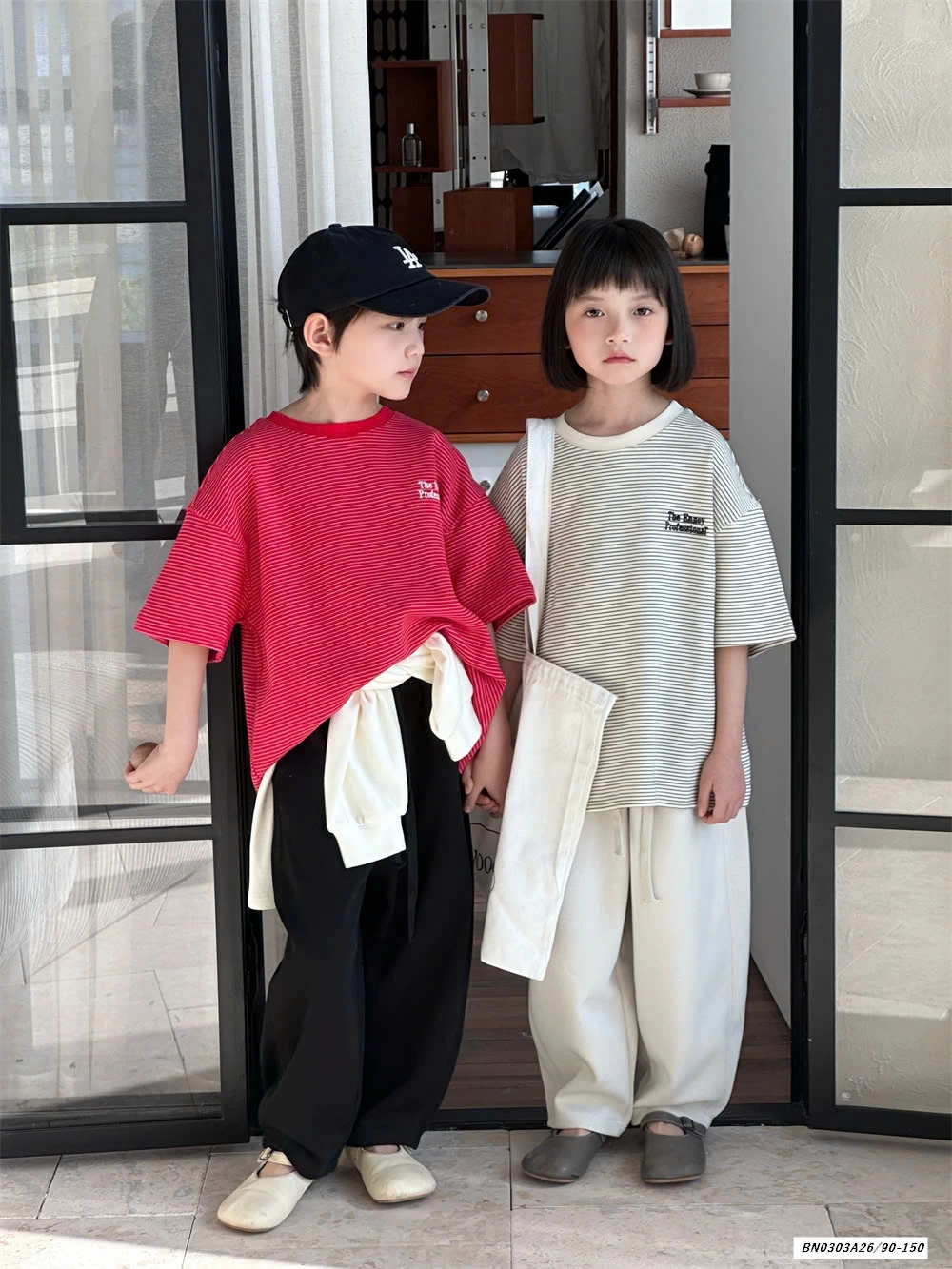 ÁO KẺ THÊU CHỮ NGỰC