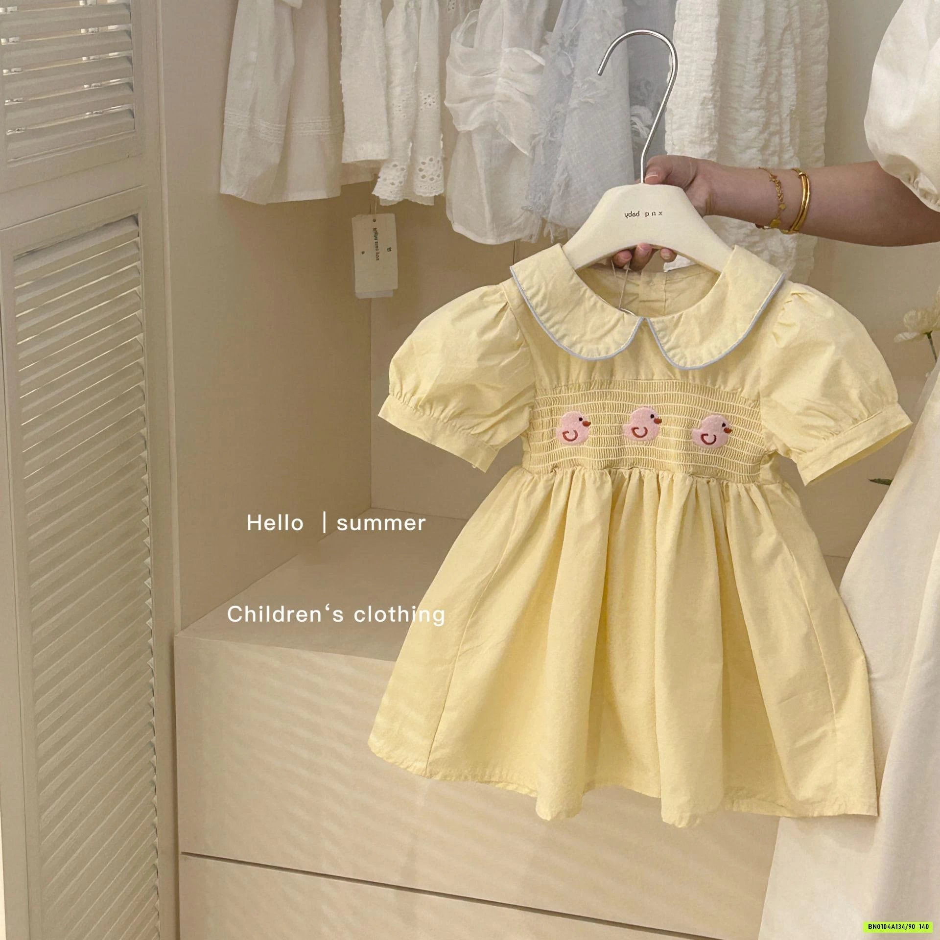 ĐẦM VÀNG TAY BỒNG THÊU VỊT